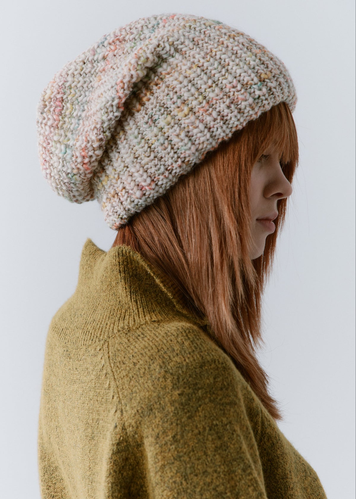 London Snowdrop knit beanie: Side portrait of the relaxed crown