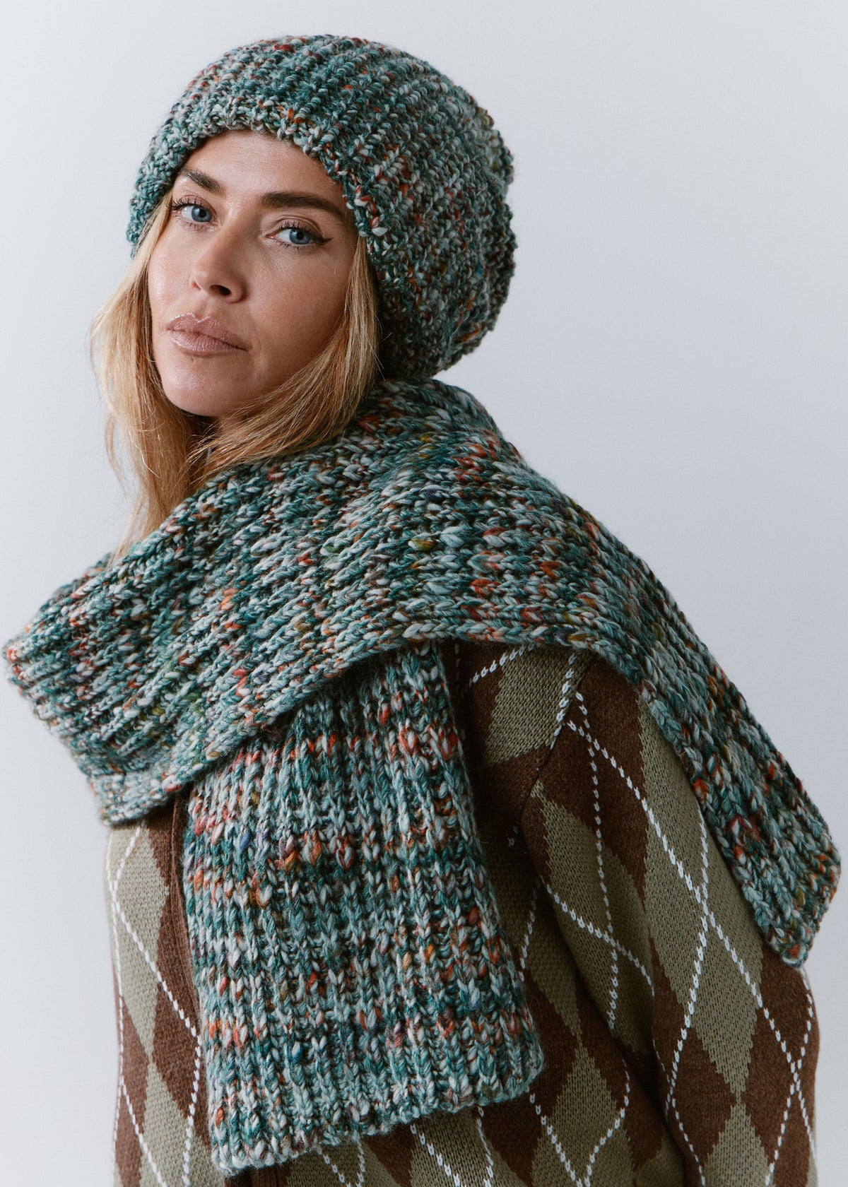 London Green and Orange knit beanie: Three-quarter portrait with matching scarf, sold separately