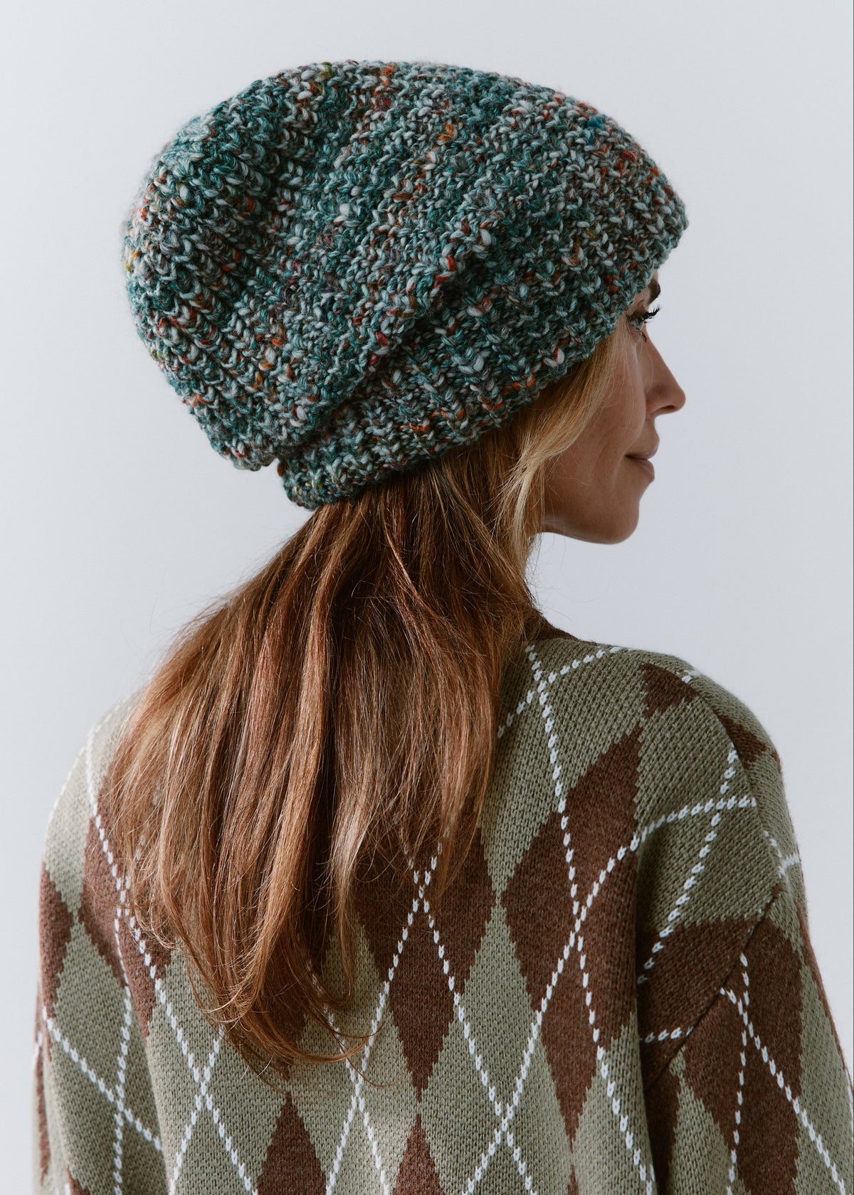 London Green and Orange knit beanie: Rear side view of the slouchy crown
