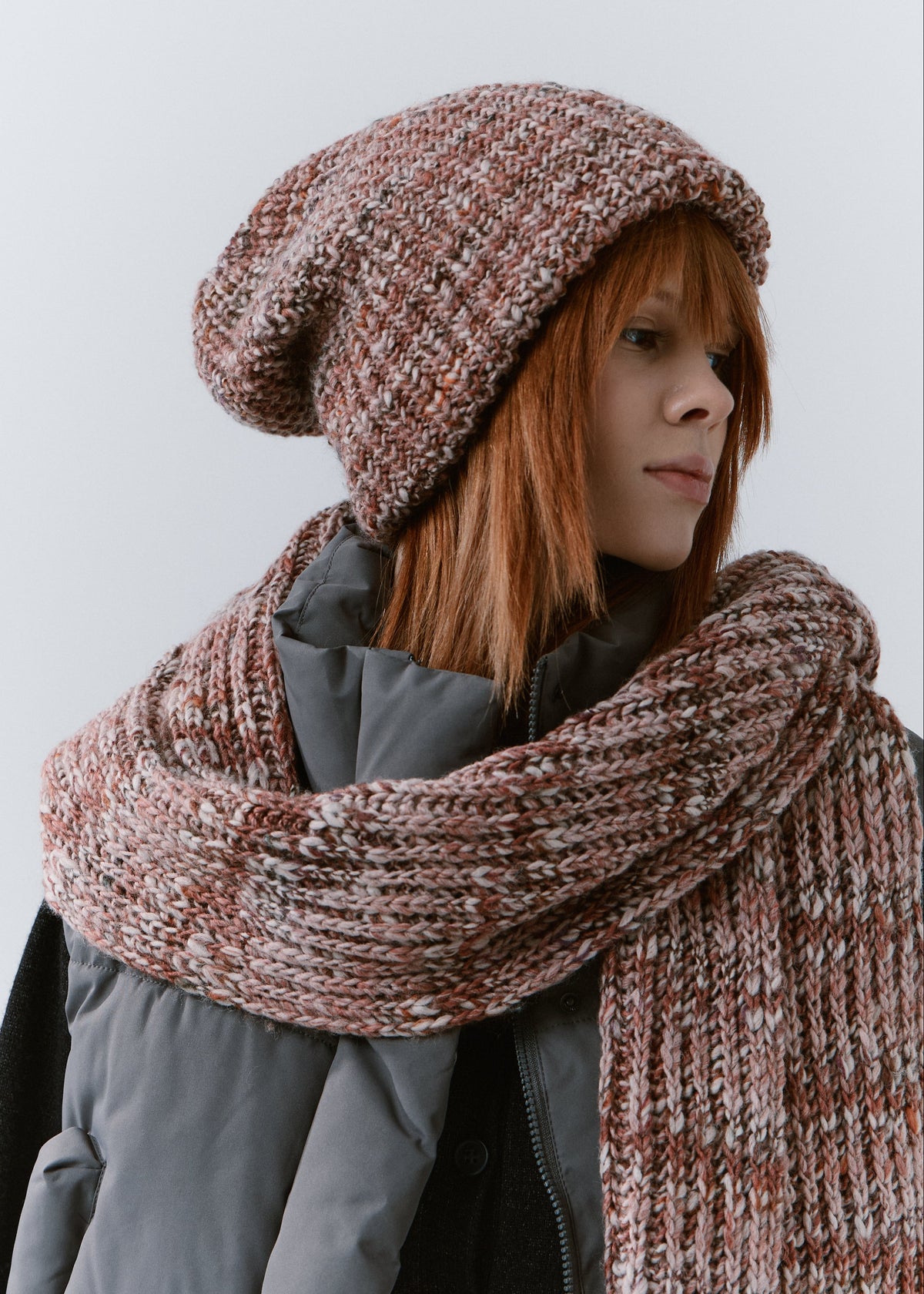 London Rose knit beanie: Three-quarter portrait with matching scarf, sold separately