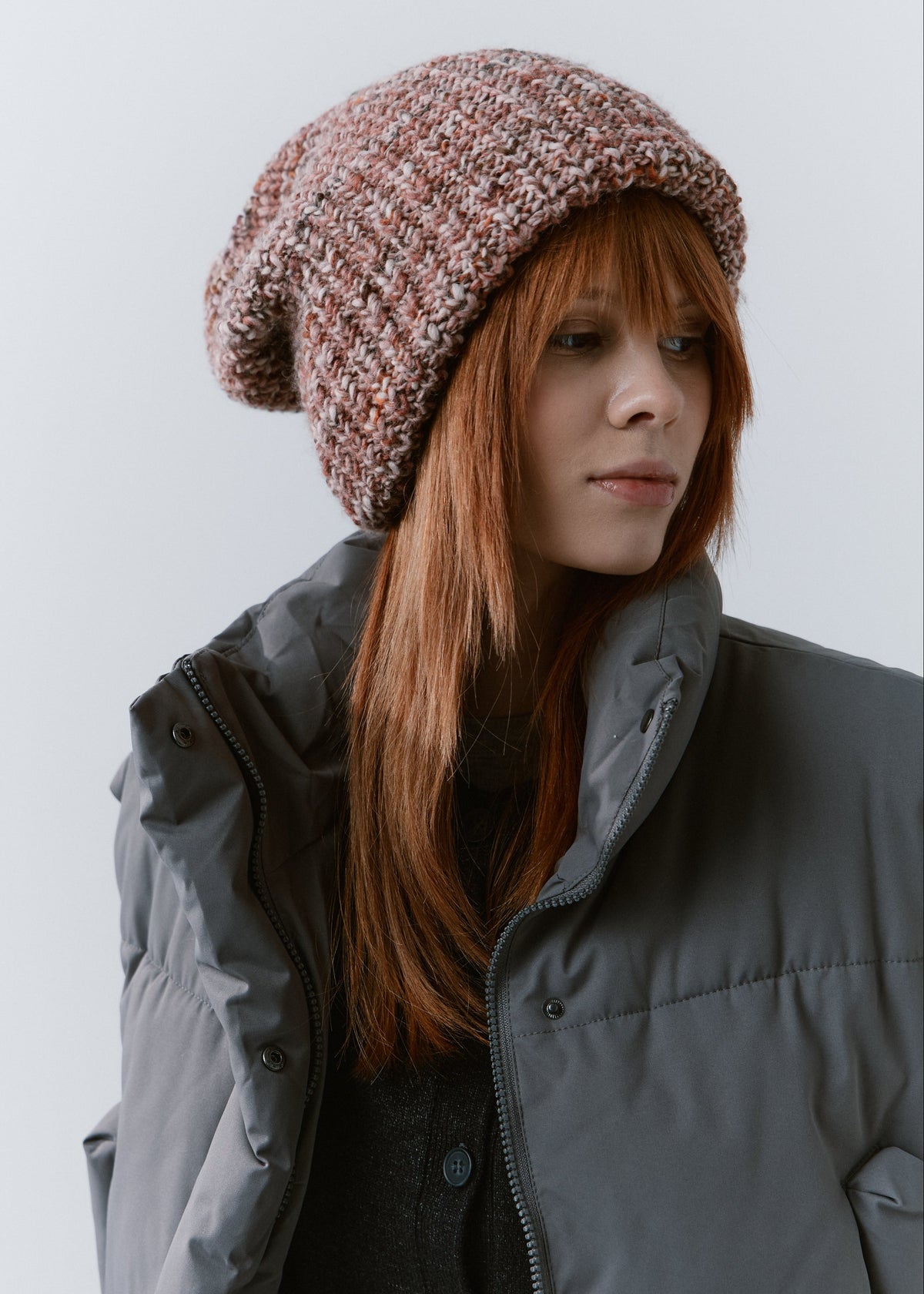 London Rose knit beanie: Three-quarter portrait showing the brim