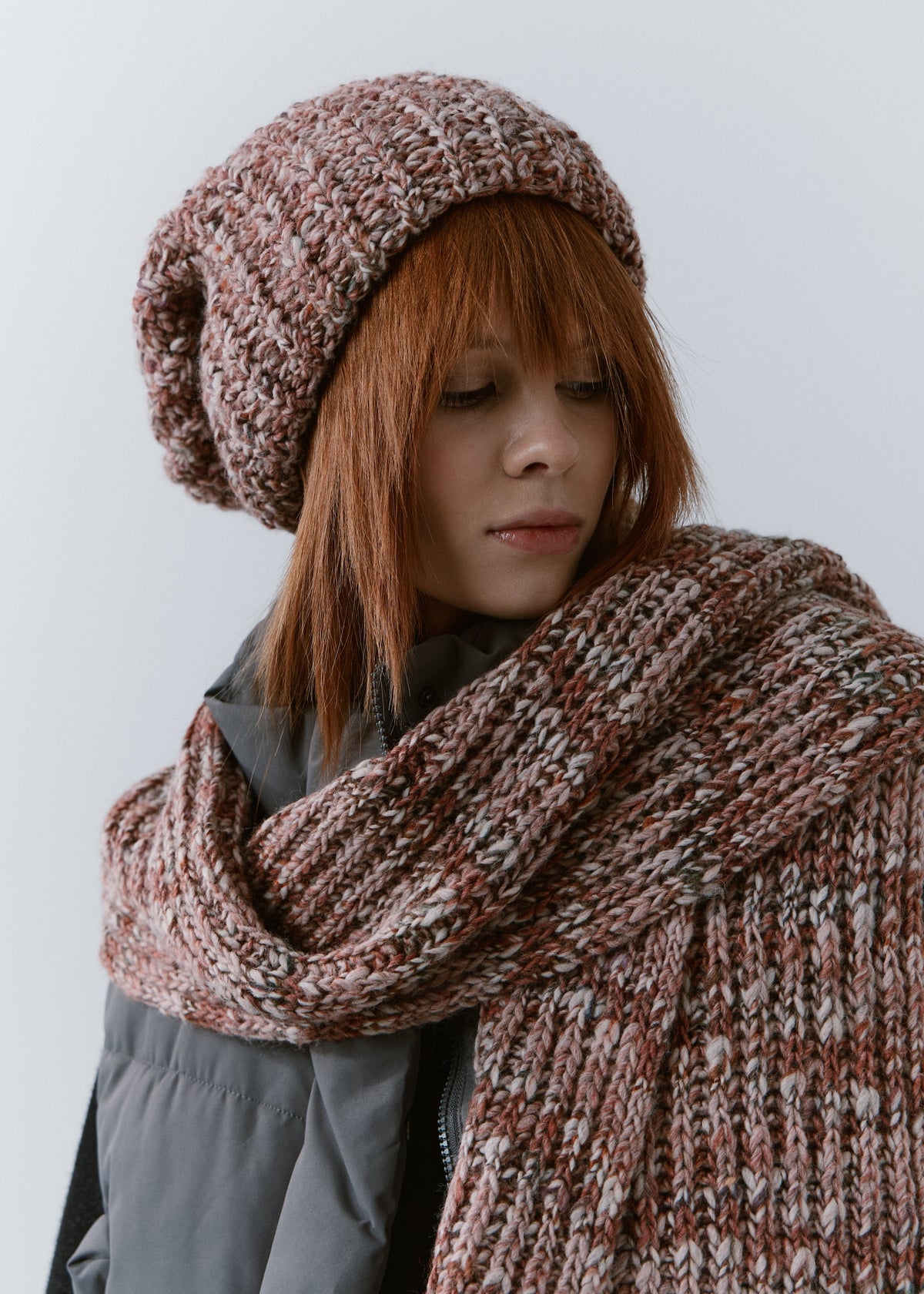 BRIKOLY Rose oversized multicolor knit beanie shown in a close three-quarter view with a matching scarf.