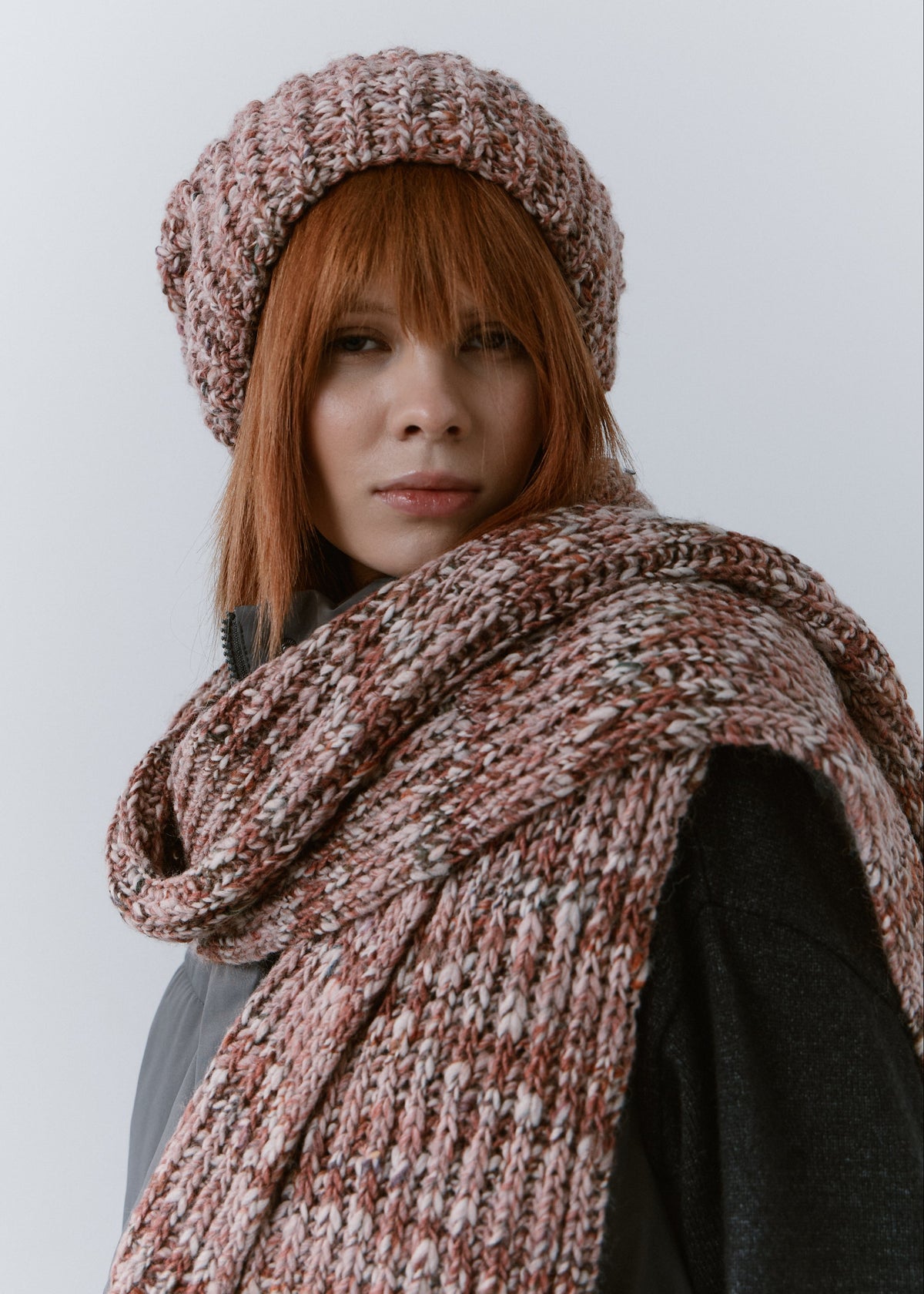 BRIKOLY Rose oversized multicolor knit beanie worn by a model in a front view with a matching scarf.