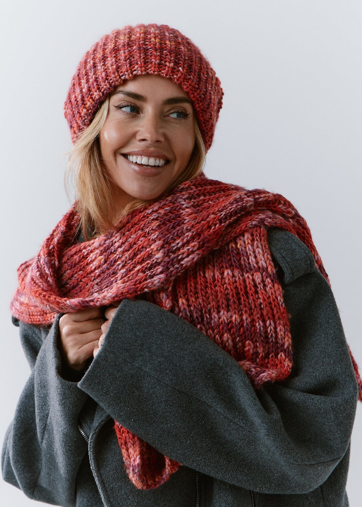 London Red knit beanie: Smiling portrait with matching scarf, sold separately