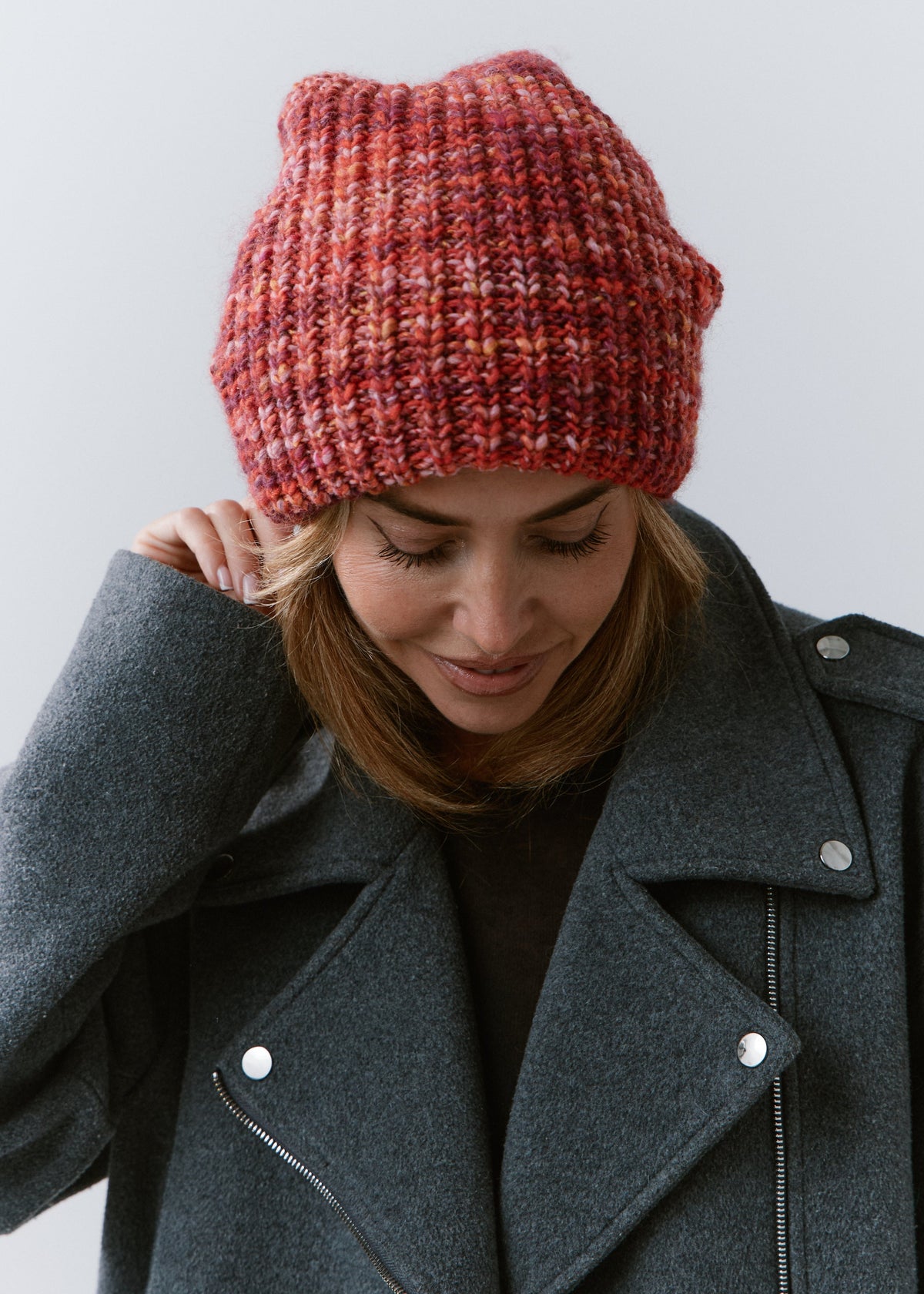 London Red knit beanie: Looking-down front portrait