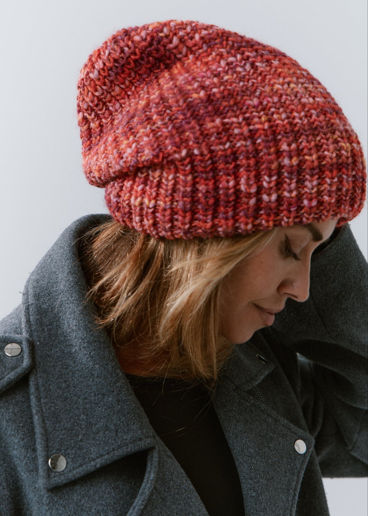 London Red knit beanie: Looking-down side view