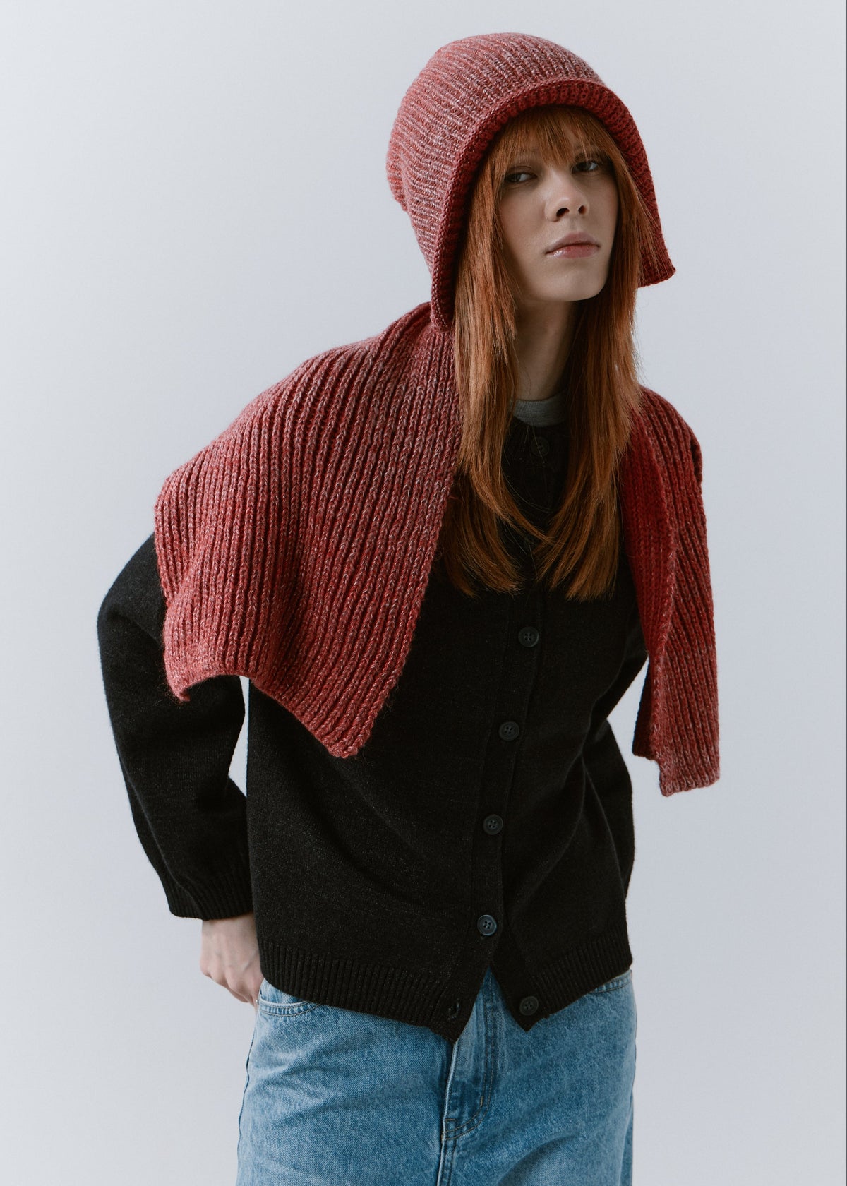 BRIKOLY Lisse Cherry ribbed knit scarf shown draped across a model's shoulders in a wider front view.