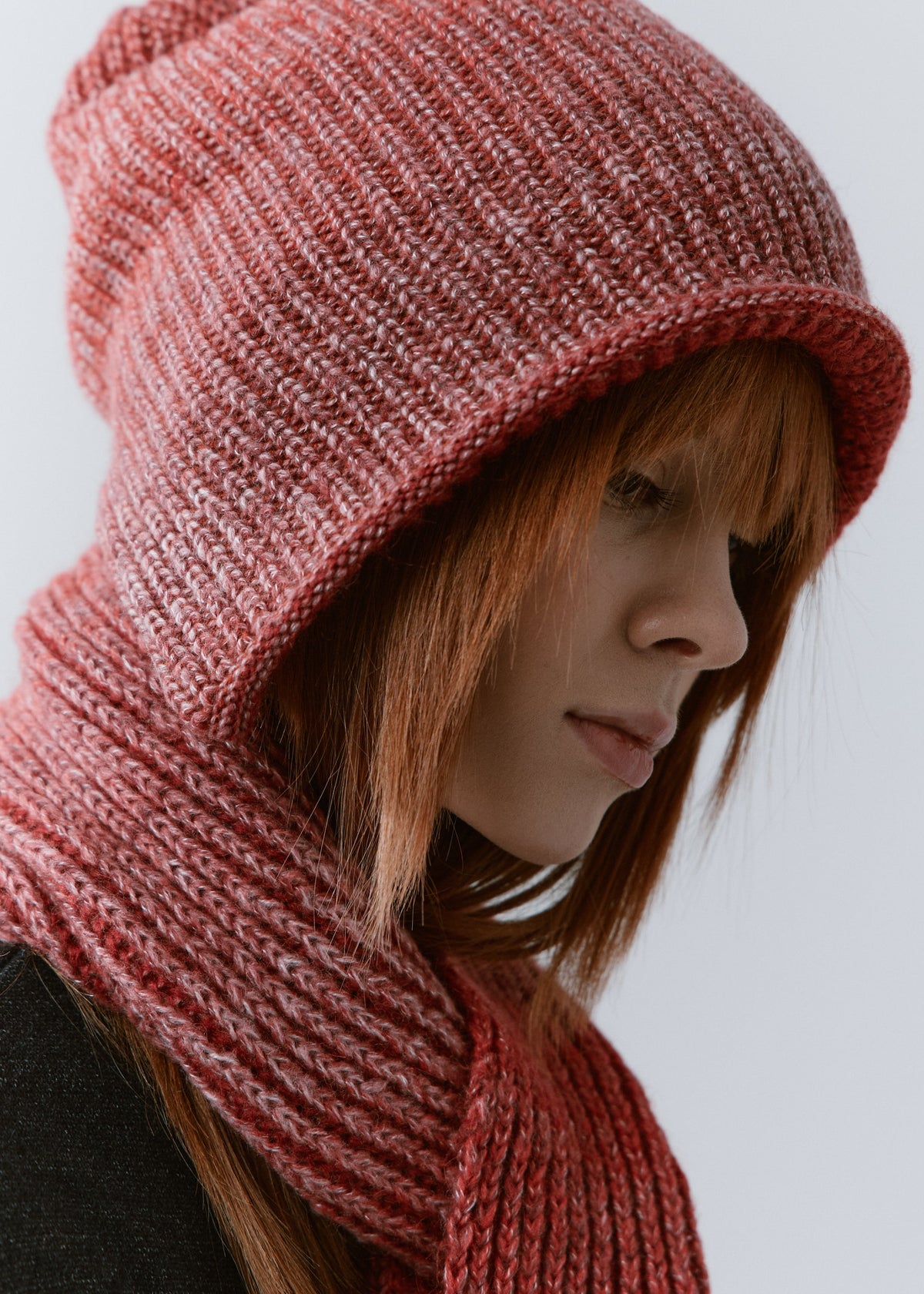 BRIKOLY Lisse Cherry ribbed knit scarf shown close up to reveal the rose-red ribbed knit.