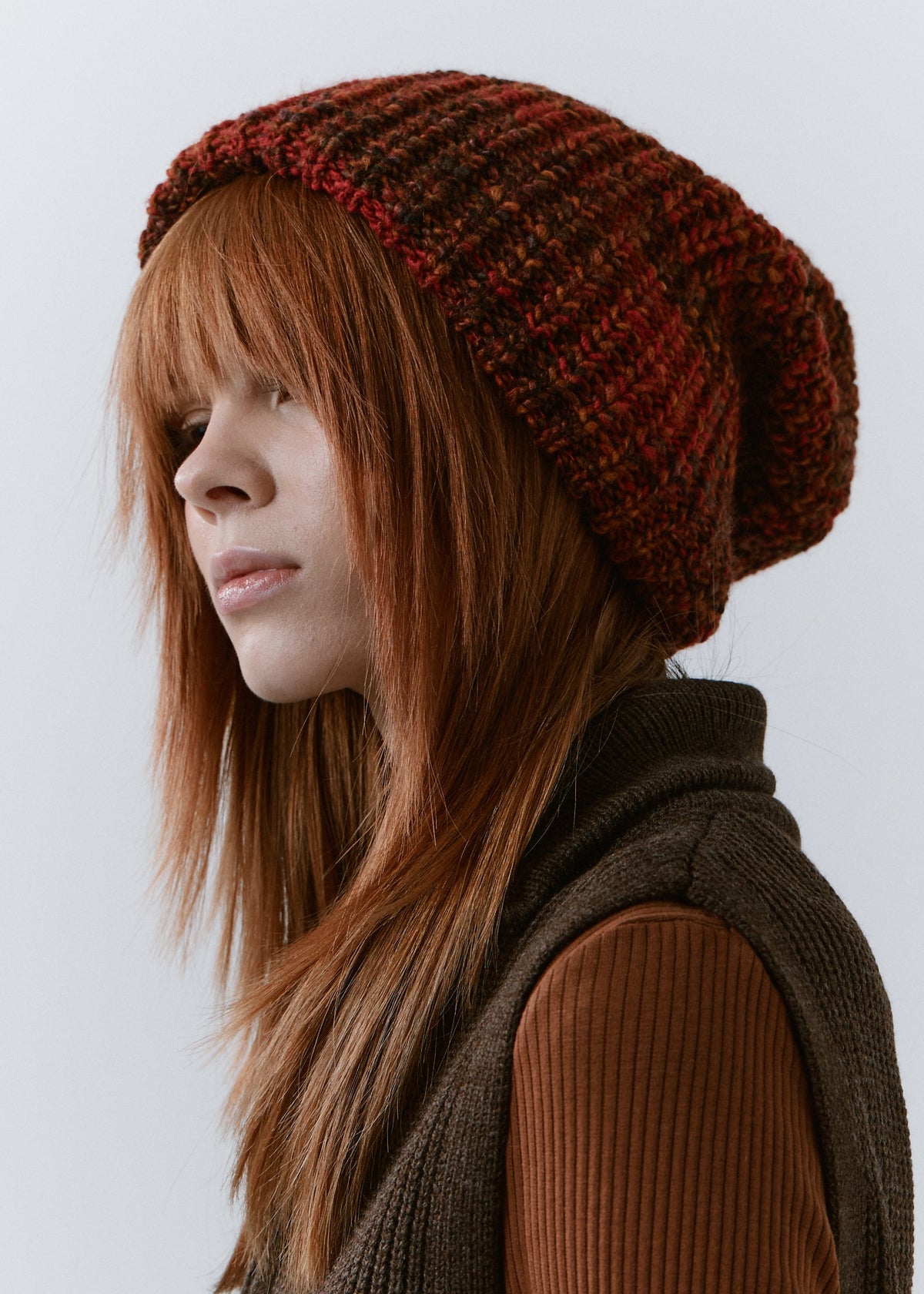 London Brown knit beanie: Three-quarter portrait showing the ribbed brim