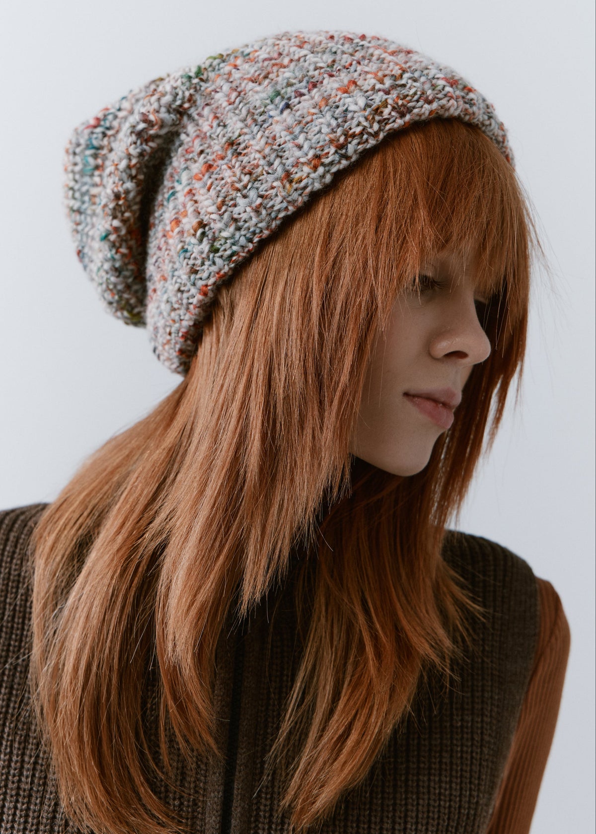 London FAN knit beanie: Side portrait showing knit texture