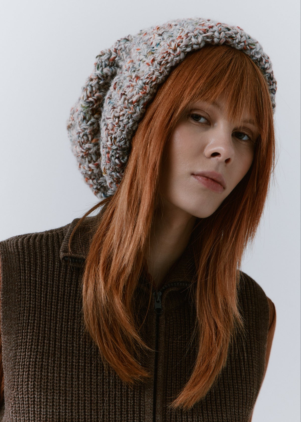 BRIKOLY FAN oversized multicolor knit beanie shown in a front view on a model.