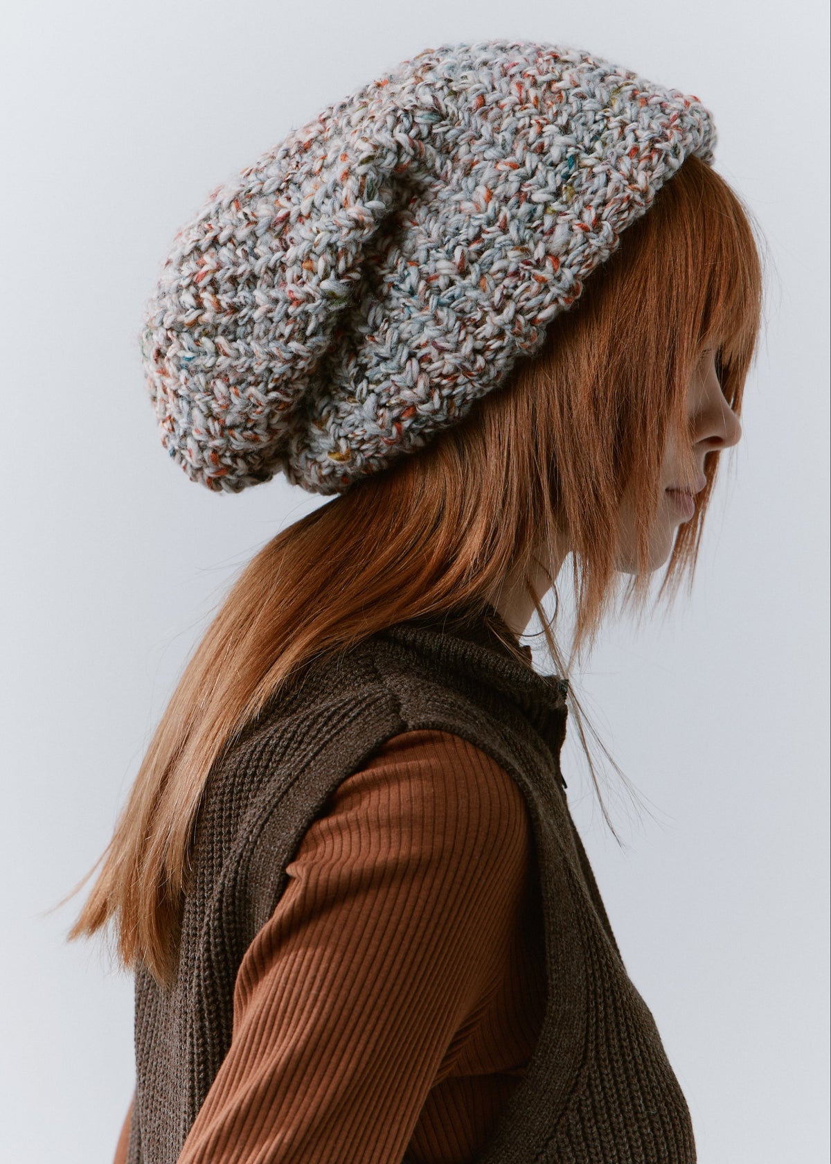 BRIKOLY FAN oversized multicolor knit beanie shown from the rear side to reveal the slouchy shape.