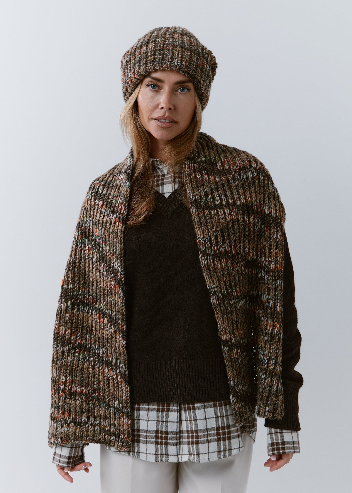 London Multicolor knit beanie: Full outfit view with matching scarf draped over shoulders, sold separately