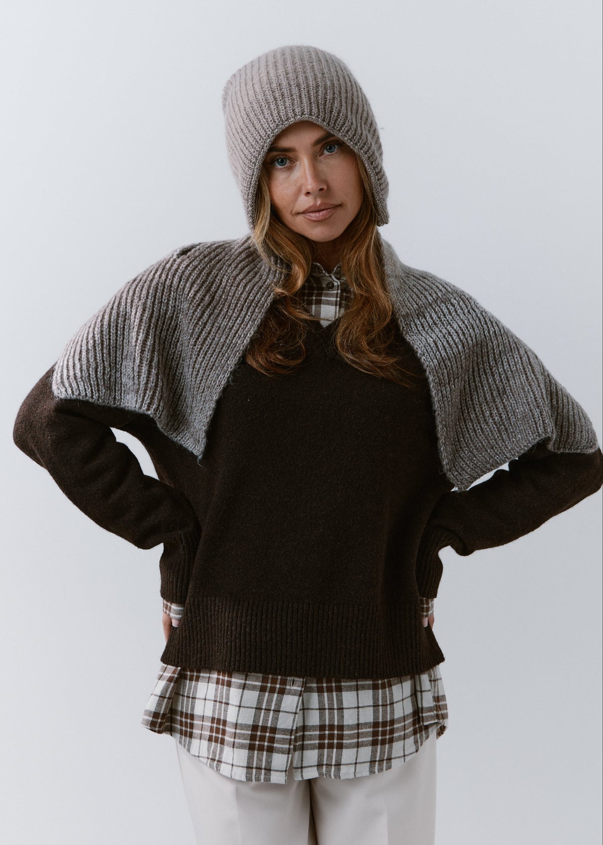 BRIKOLY Lisse Gray ribbed knit scarf shown draped across a model's shoulders in a front view.