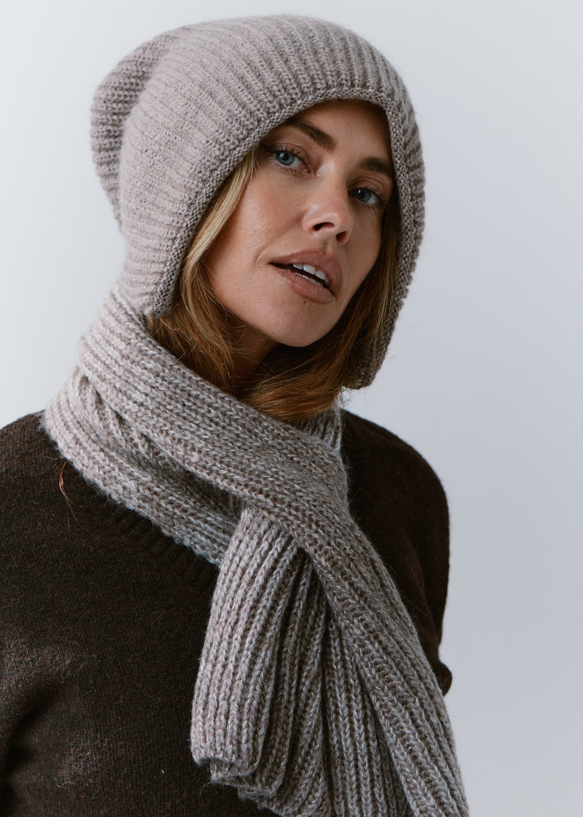 BRIKOLY Lisse Gray ribbed knit scarf shown in a three-quarter view with one end hanging in front.