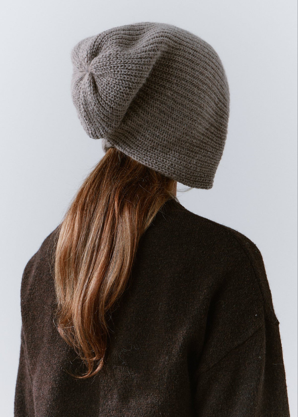 BRIKOLY Lisse Gray reversible ribbed knit beanie shown from the back to reveal its knit crown.