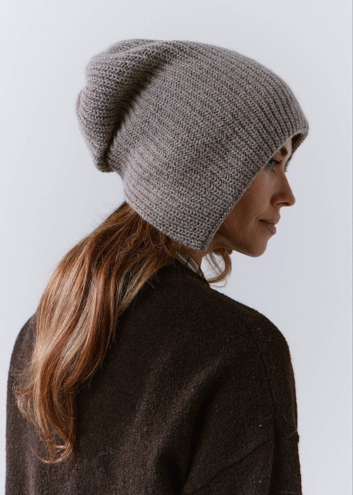BRIKOLY Lisse Gray reversible ribbed knit beanie shown from the rear side to reveal its relaxed shape.