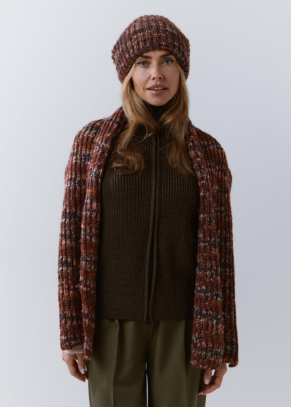 London Eggplant knit beanie: Full outfit view with matching scarf draped over shoulders, sold separately