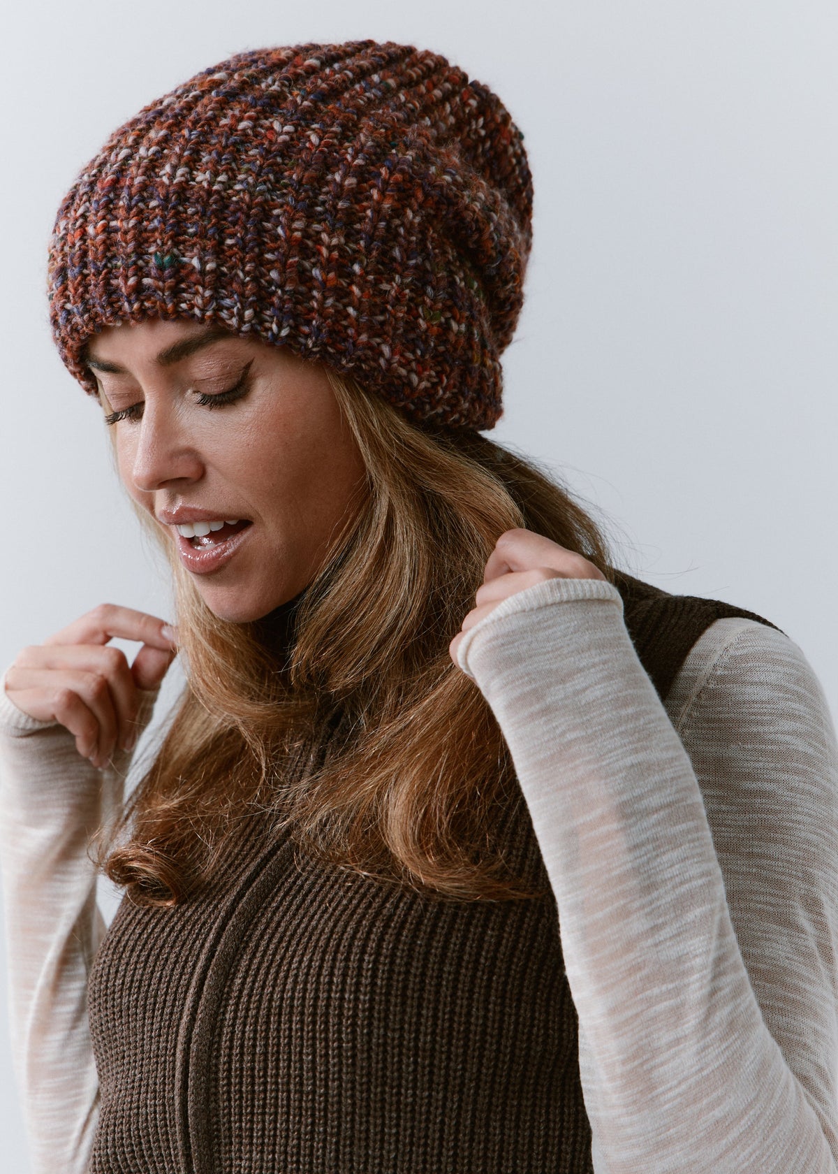 London Eggplant knit beanie: Looking-down portrait