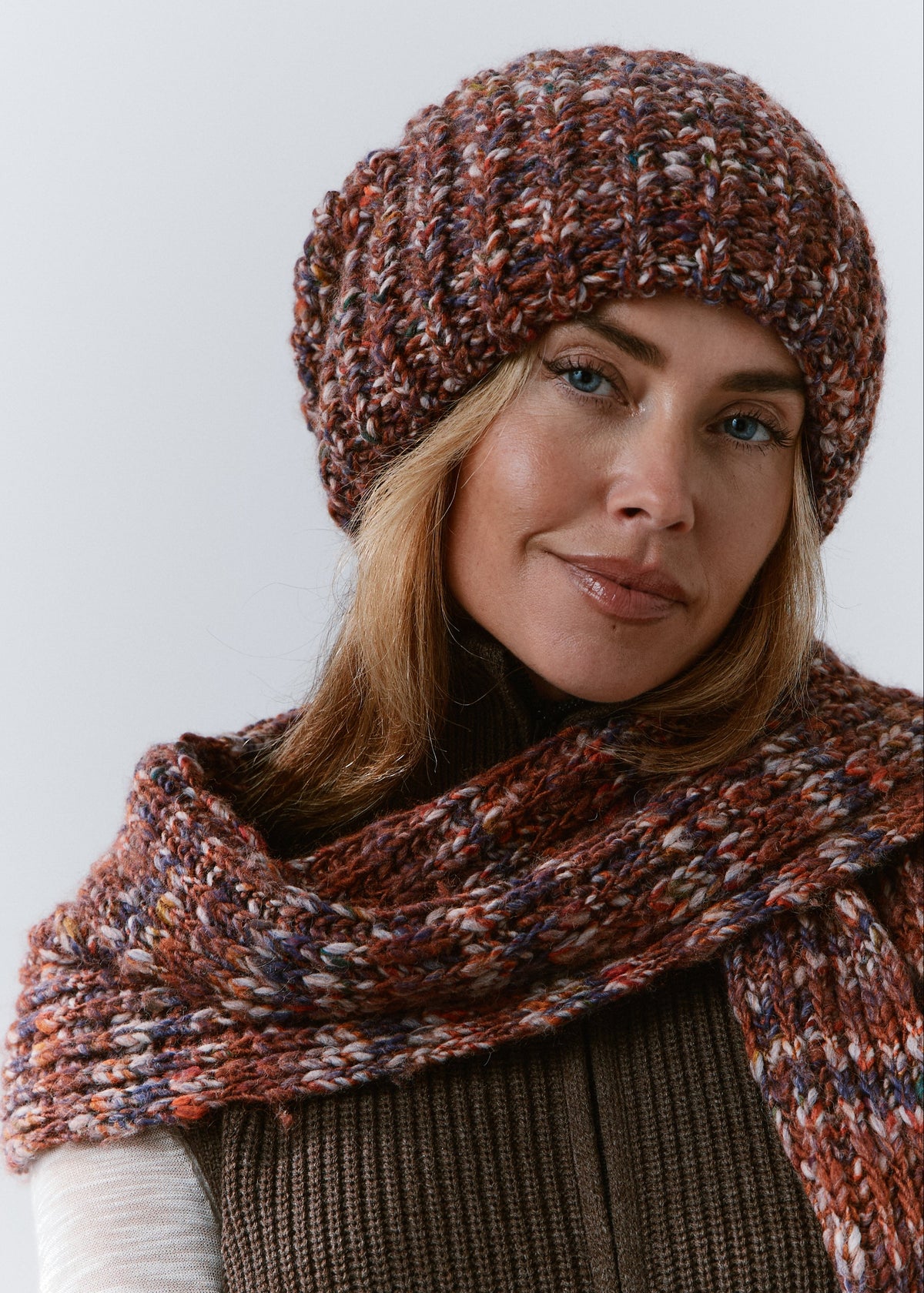 BRIKOLY Eggplant oversized multicolor knit beanie shown in a close front view with a matching scarf.