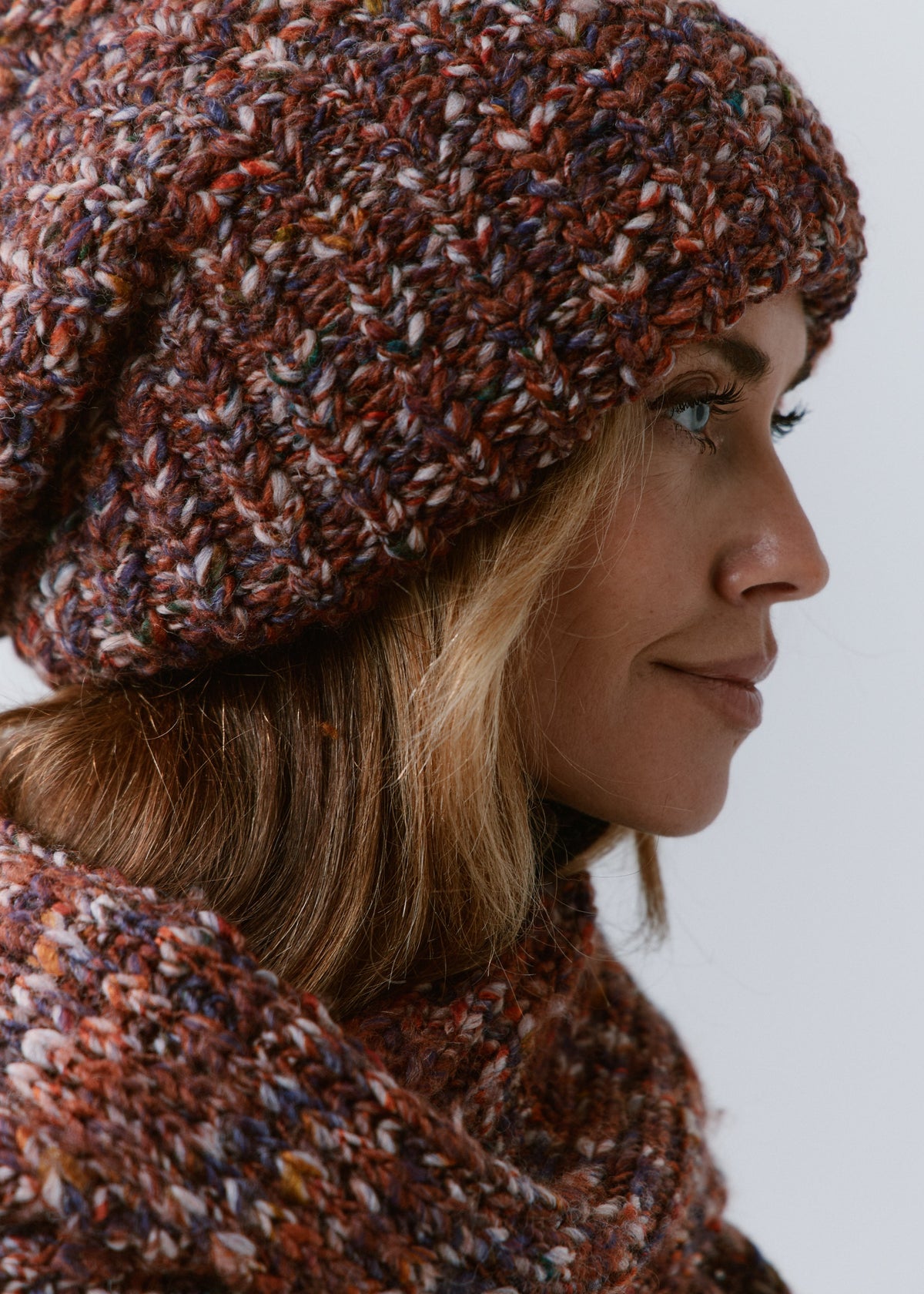 BRIKOLY Eggplant oversized multicolor knit beanie shown close up to reveal its multicolor yarn and chunky ribbed brim.