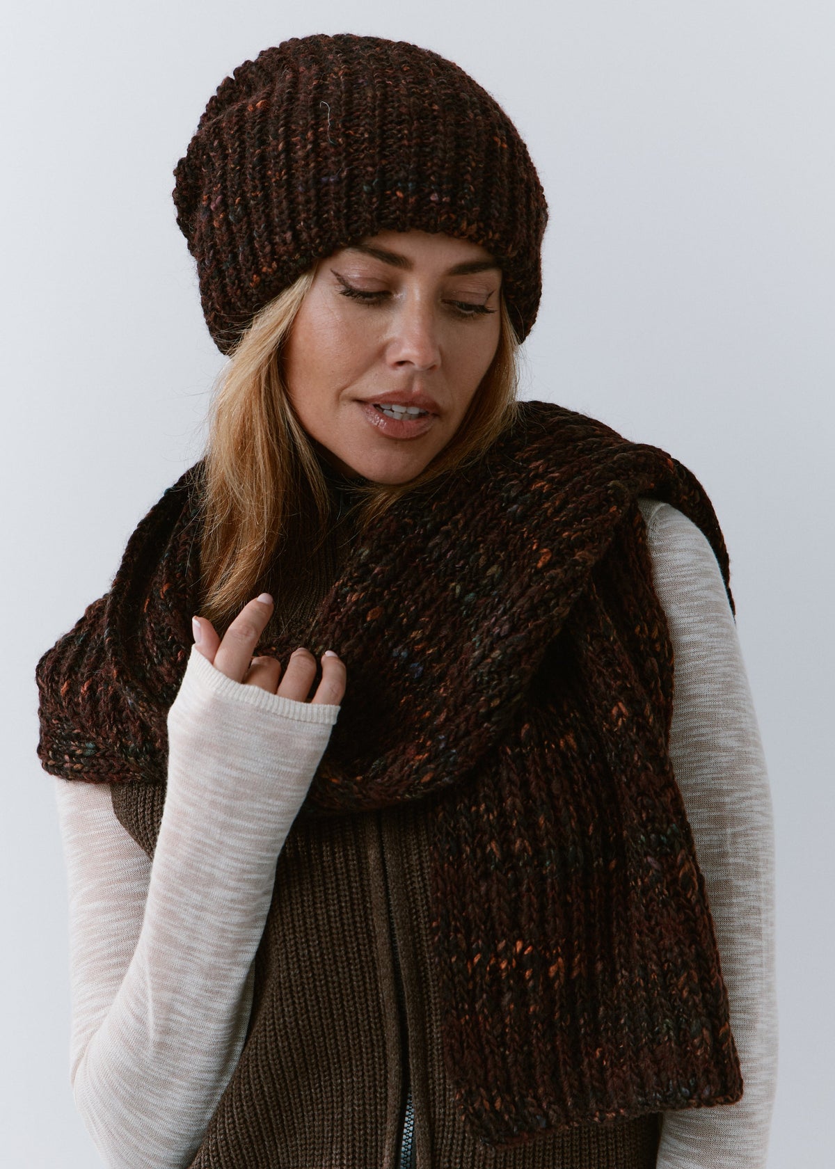 London Burgundy and Black knit beanie: Looking-down portrait with matching scarf, sold separately