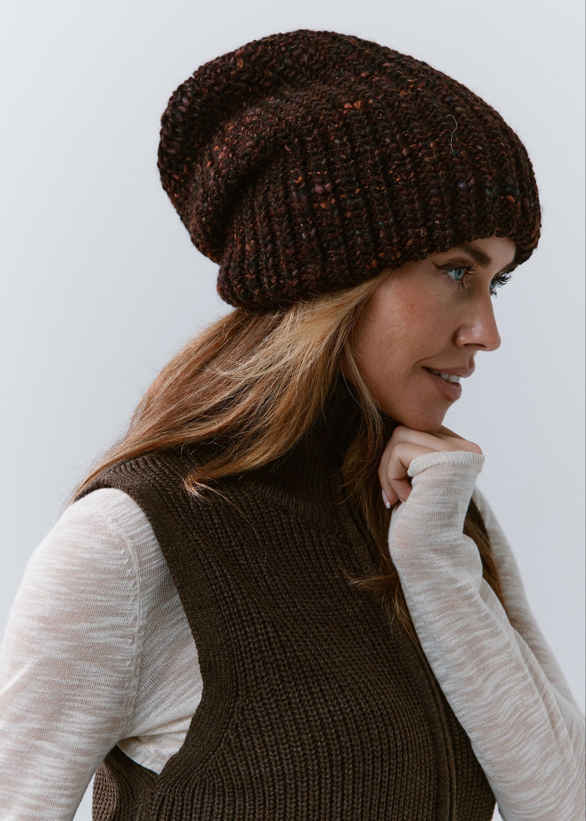 London Burgundy and Black knit beanie: Side profile showing the relaxed crown