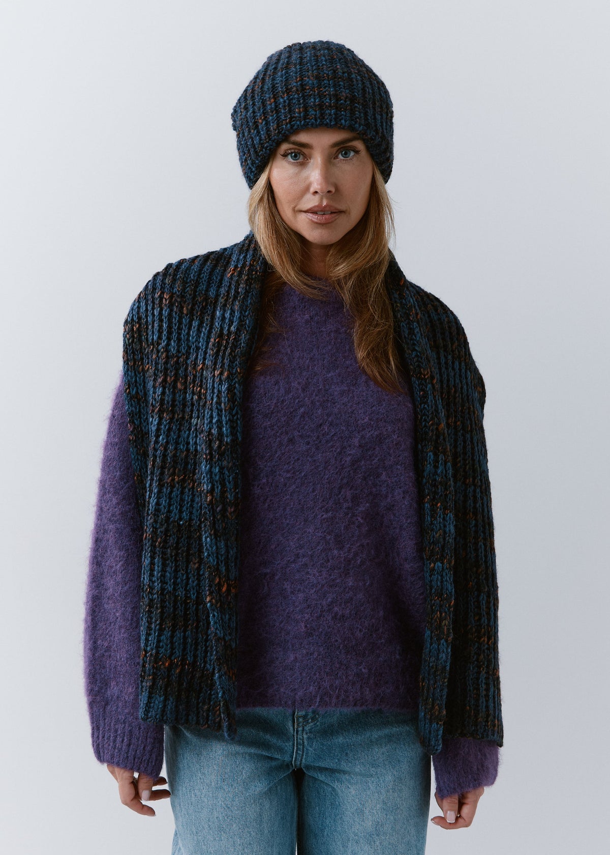London Dark Lavender knit beanie: Full outfit view with matching scarf draped over shoulders, sold separately