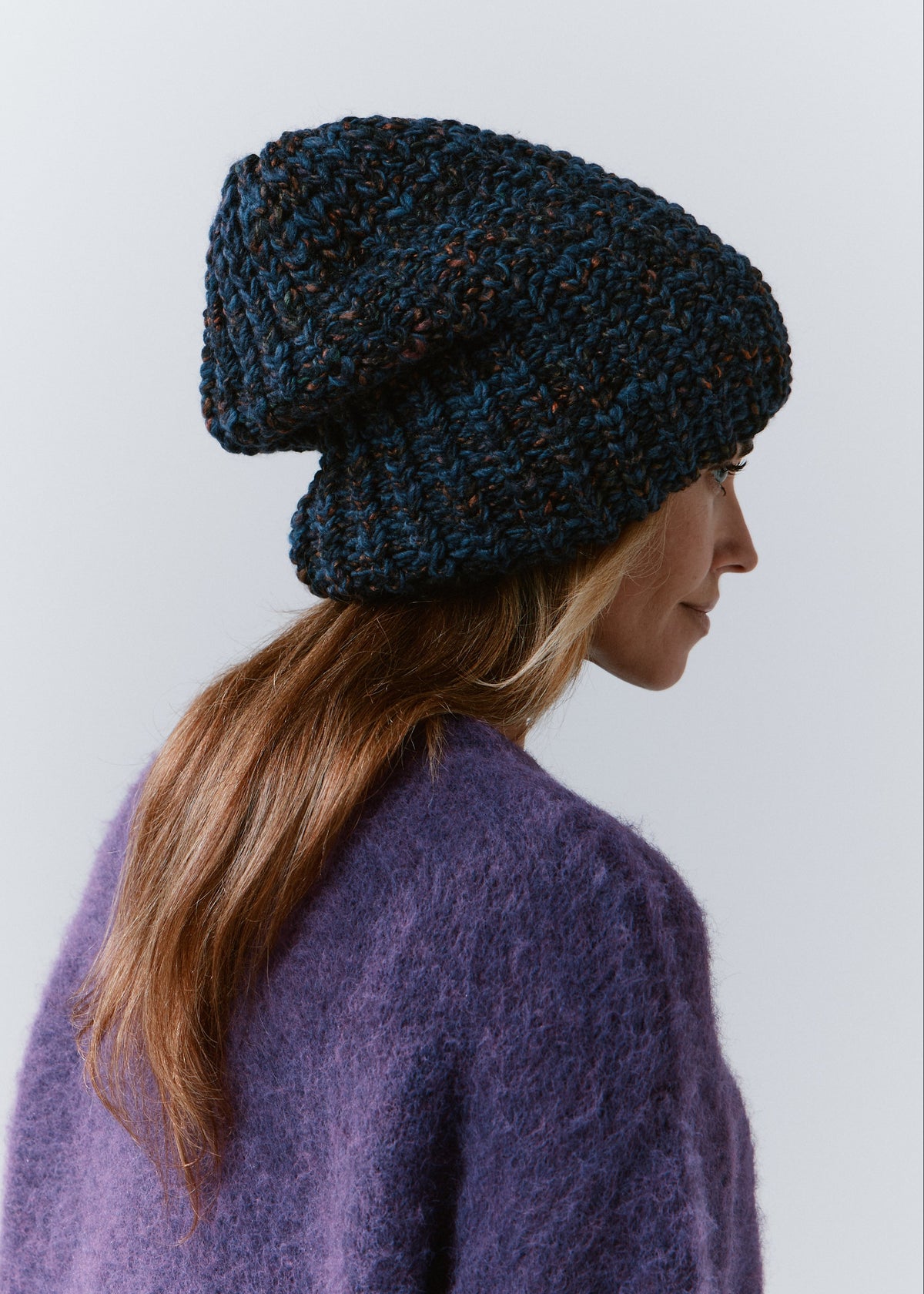 BRIKOLY Dark Lavender oversized knit beanie shown from the rear side to reveal its slouchy shape.