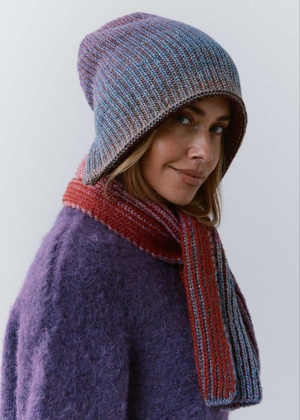 BRIKOLY Lisse Violet multicolor ribbed knit scarf wrapped around a model's neck in a close side view.