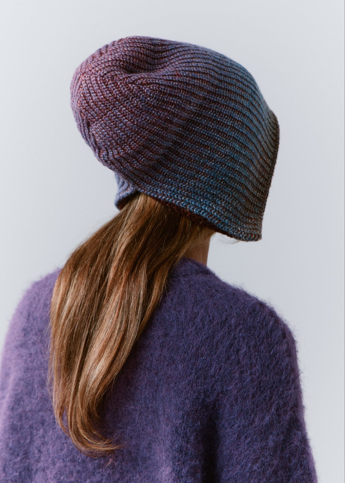 BRIKOLY Lisse Violet reversible ribbed knit beanie shown from the back to reveal the knit crown.