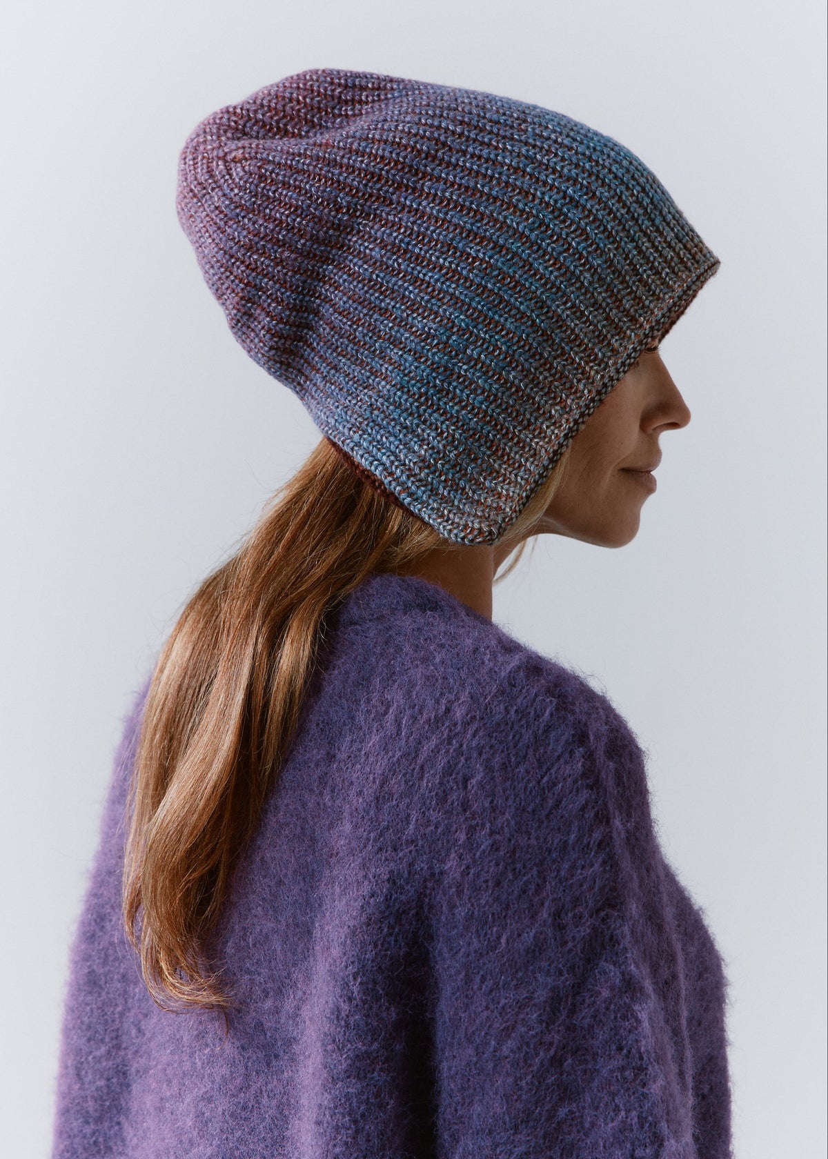BRIKOLY Lisse Violet reversible ribbed knit beanie shown in profile to reveal the relaxed shape.