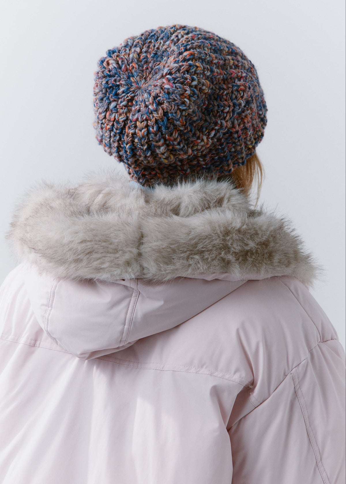 BRIKOLY Pink Blue oversized multicolor knit beanie shown from the back to reveal the knit crown.