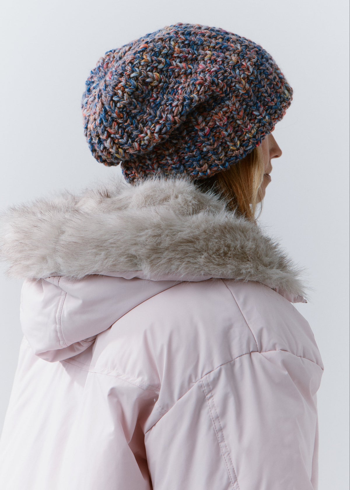 BRIKOLY Pink Blue oversized multicolor knit beanie shown from the rear side to reveal its slouchy shape.