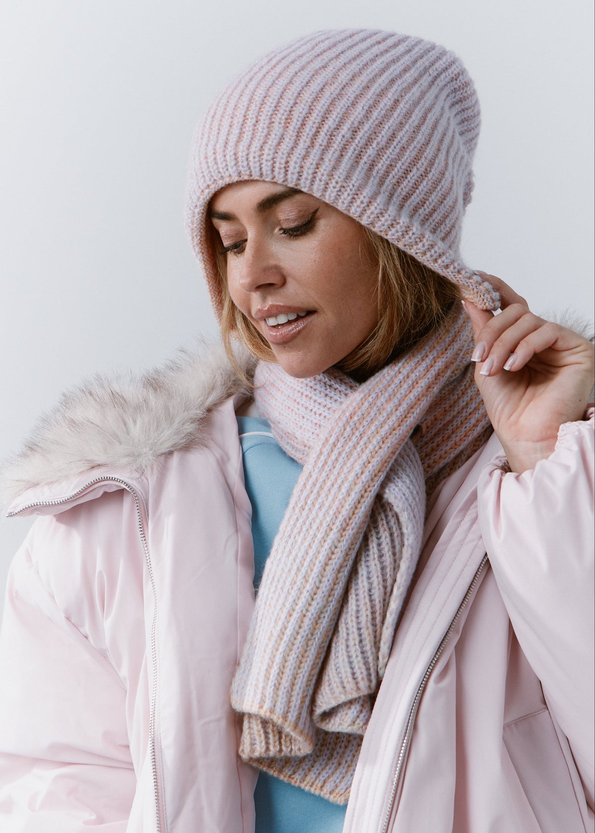 BRIKOLY Lisse Unicorn reversible ribbed knit beanie worn by a model looking down with a matching scarf.