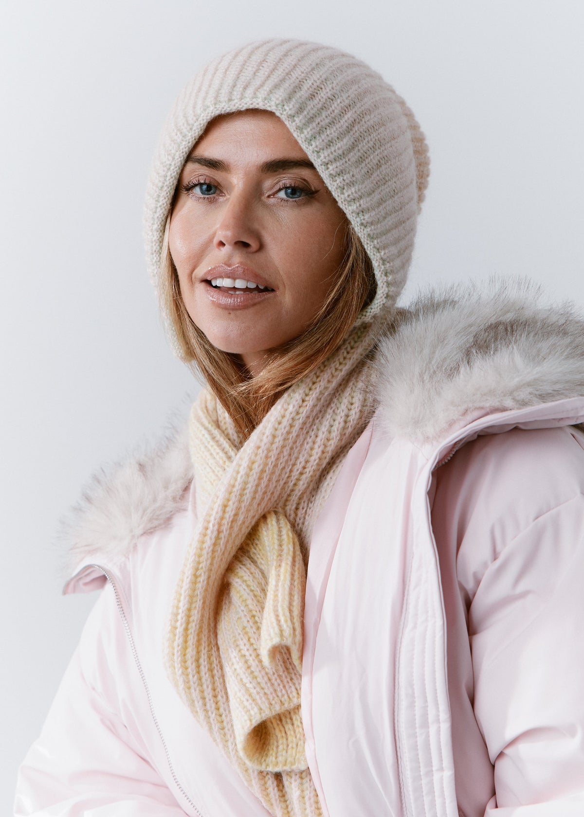 BRIKOLY Lisse Multicolor pale ribbed knit scarf shown in a three-quarter view on a model.