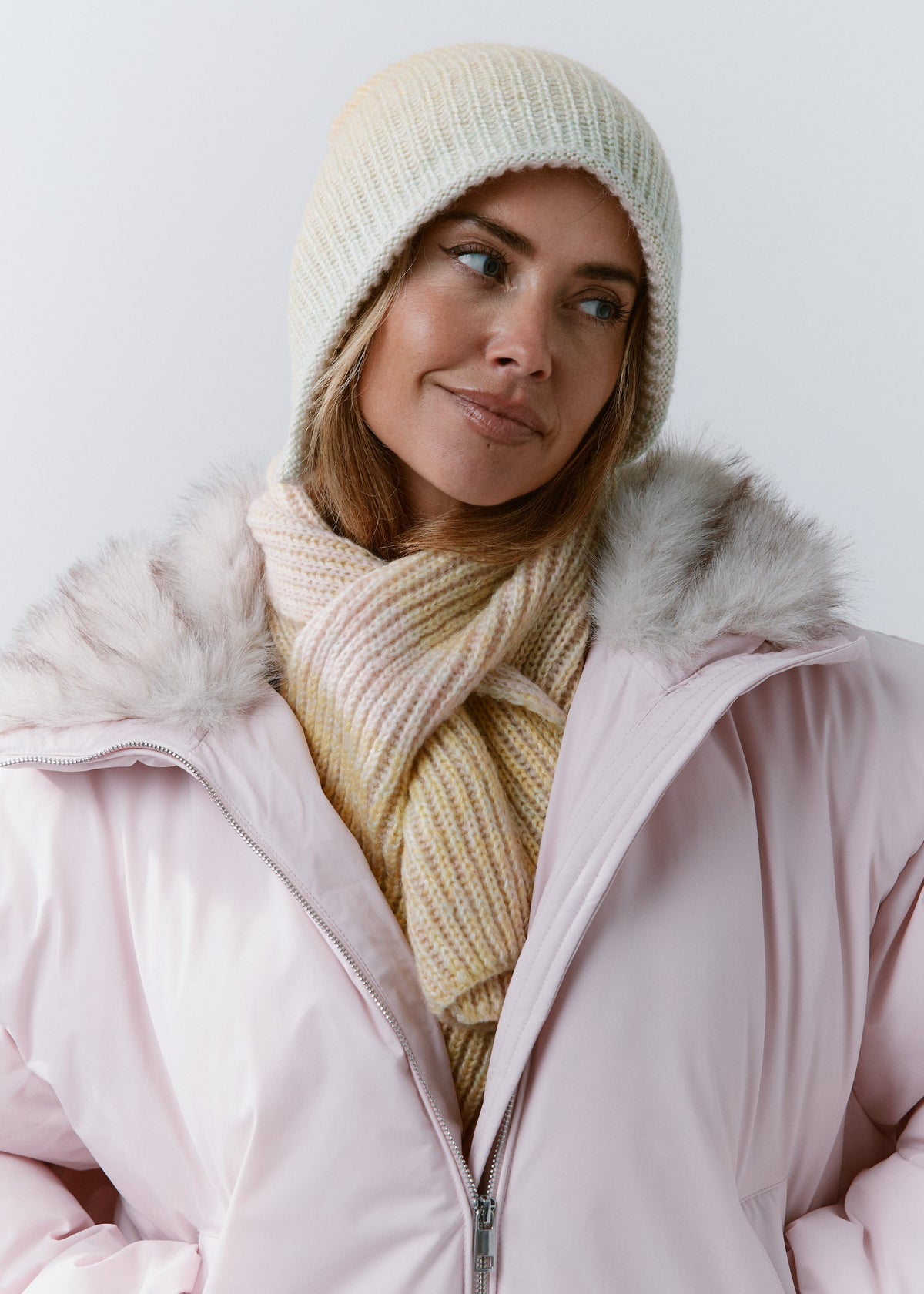 BRIKOLY Lisse Multicolor pale ribbed knit scarf shown in a close front view with pale cream and yellow tones.