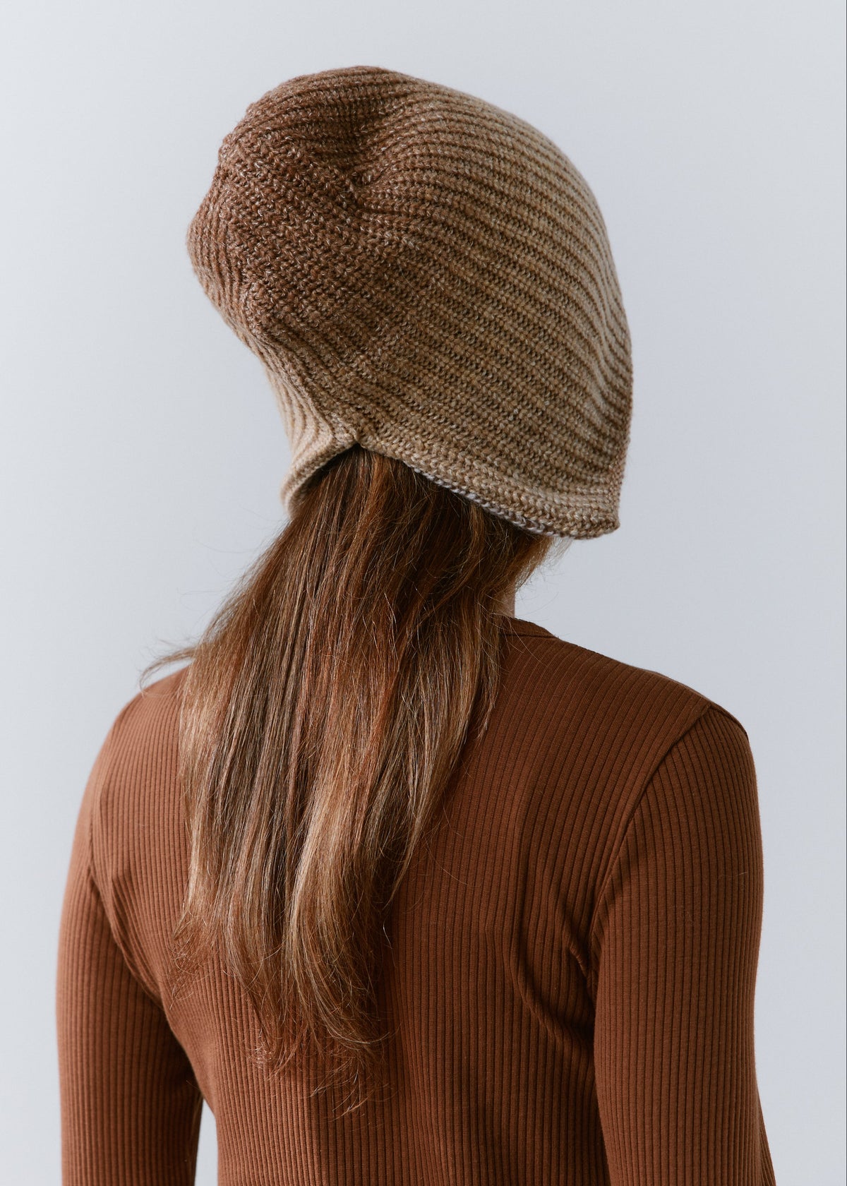 BRIKOLY Lisse Brown reversible ribbed knit beanie shown from the back to reveal the knit crown.