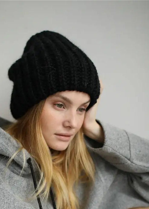 Oversized Black double-layer wool hat: Seated close-up with a relaxed crown