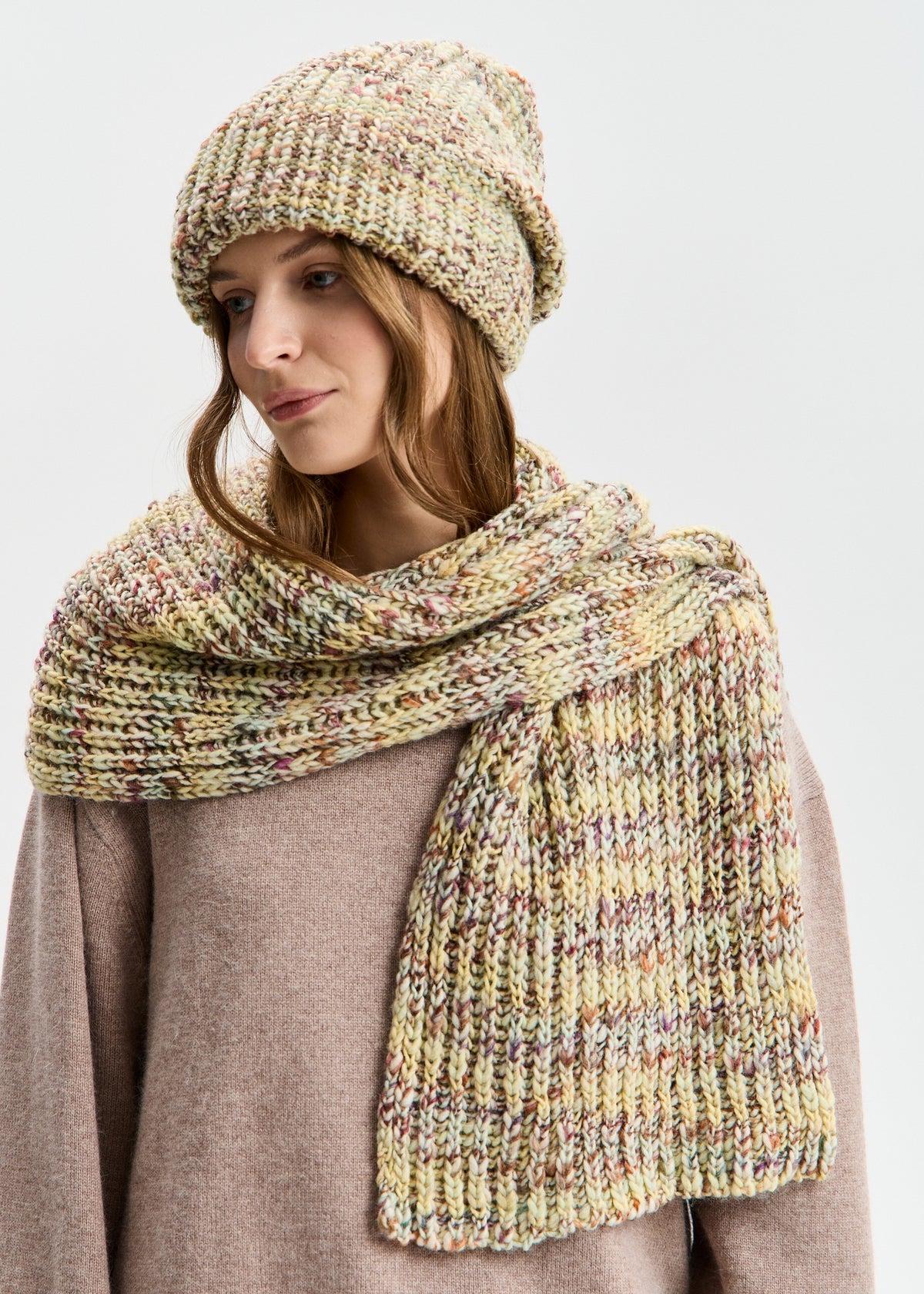 BRIKOLY London Yellow knit beanie shown in a side view with a matching scarf.