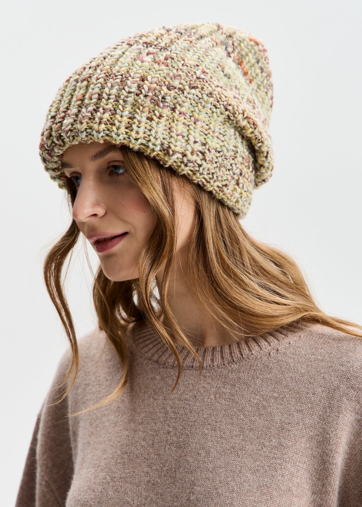 BRIKOLY London Yellow knit beanie shown in a three-quarter view.