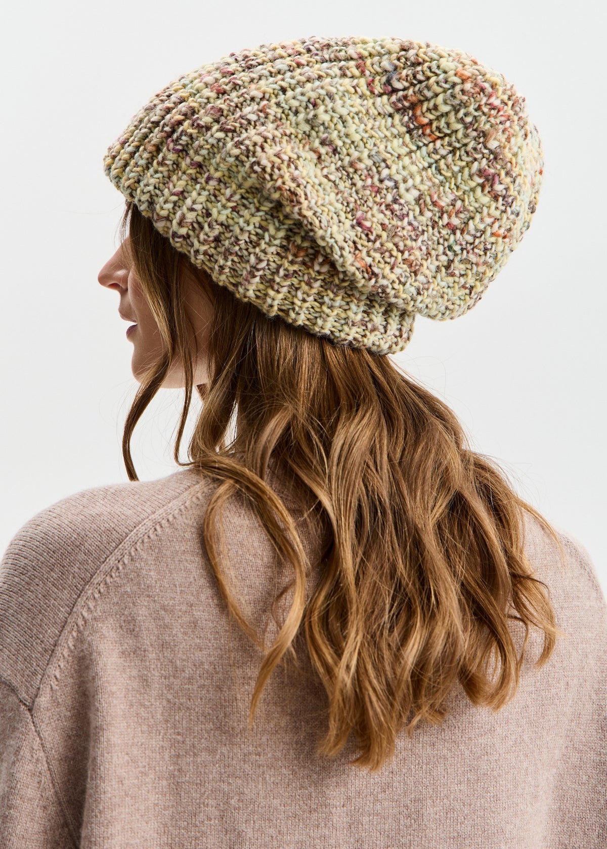 BRIKOLY London Yellow knit beanie shown from the rear side to reveal the relaxed crown.