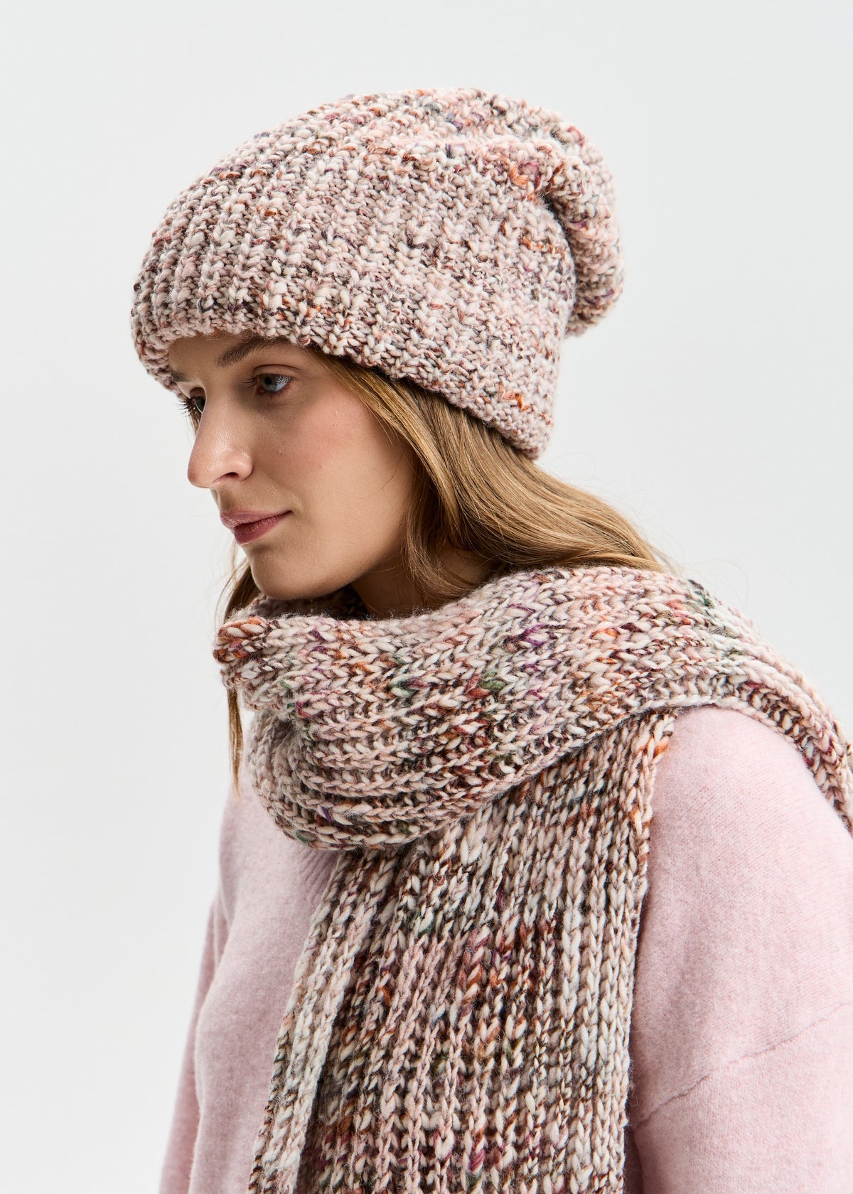 BRIKOLY London Beige multicolor knit beanie shown in profile with a matching scarf.