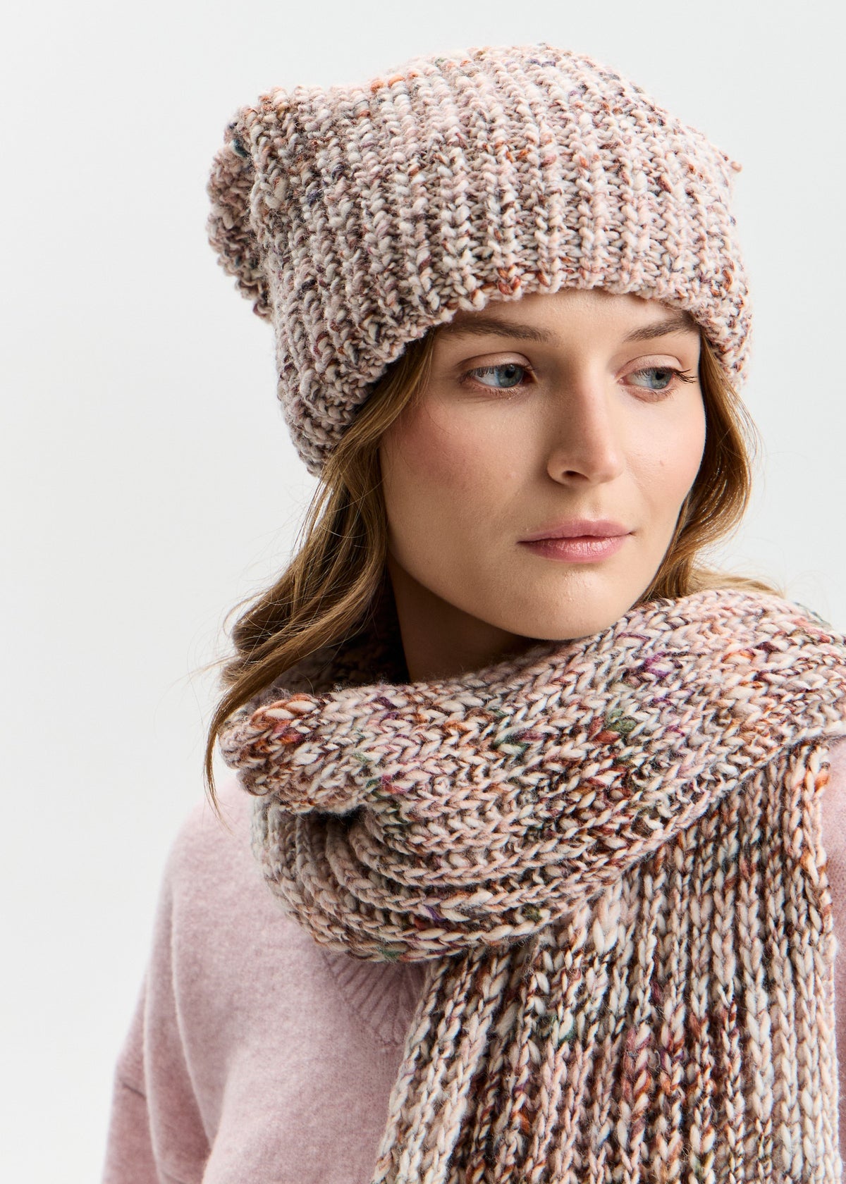 BRIKOLY London Beige multicolor knit beanie shown in a three-quarter view with a matching scarf.