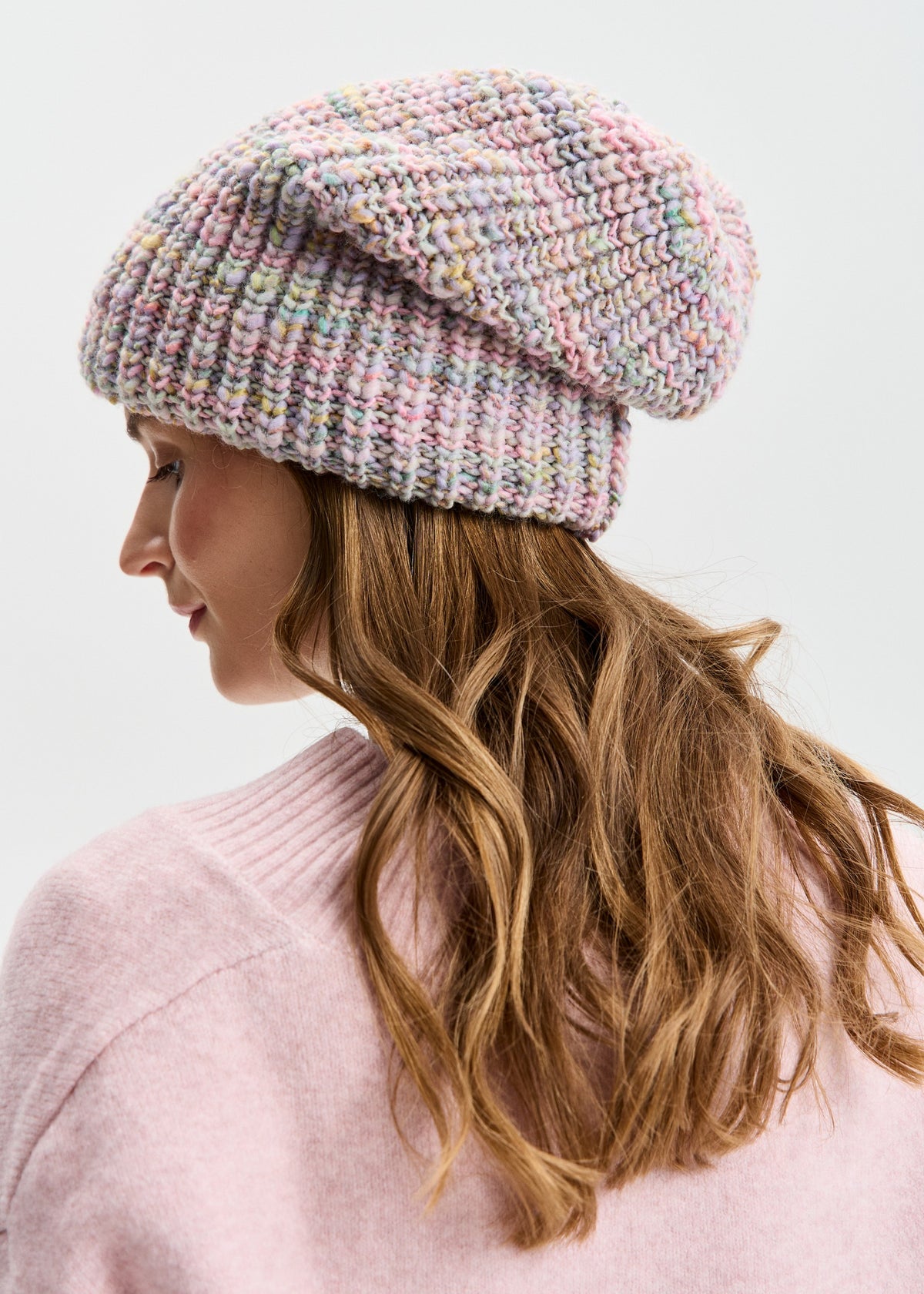 BRIKOLY London Unicorn pastel multicolor knit beanie shown from the rear side.