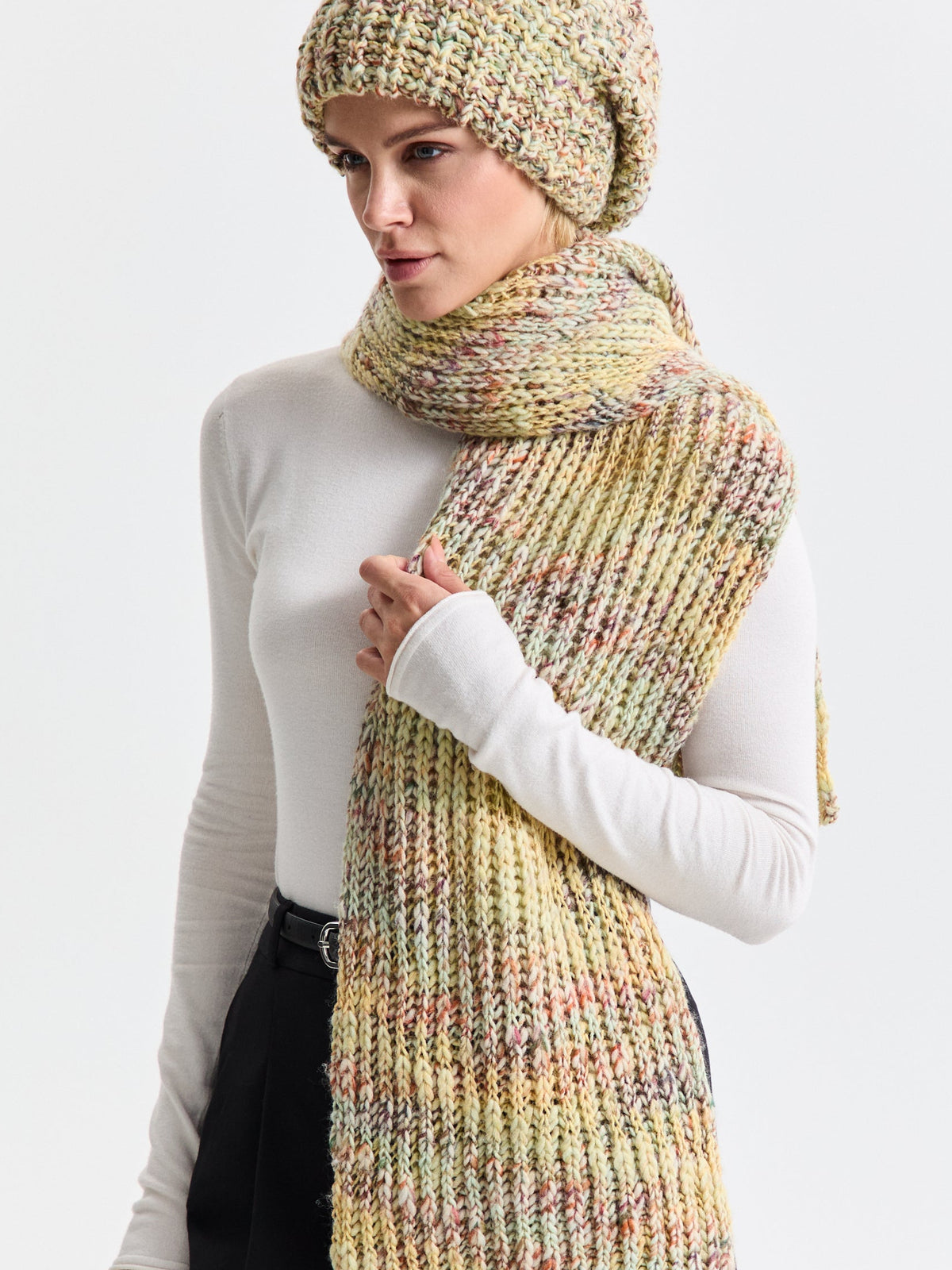 Oversized Yellow & Green alpaca-wool scarf: Outfit portrait with a long end hanging down; beanie sold separately