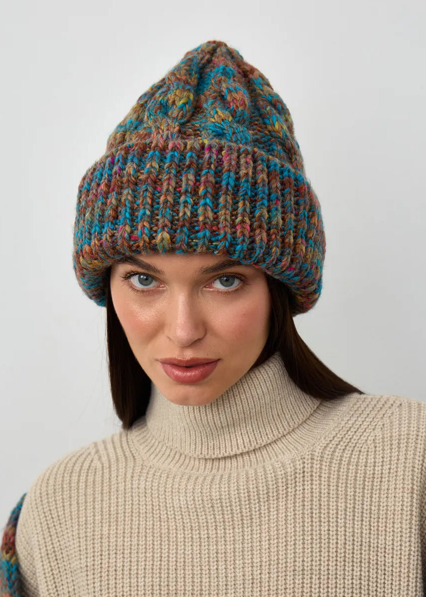 Tokyo Turquoise cable knit wool beanie: Front close-up of the cable knit crown