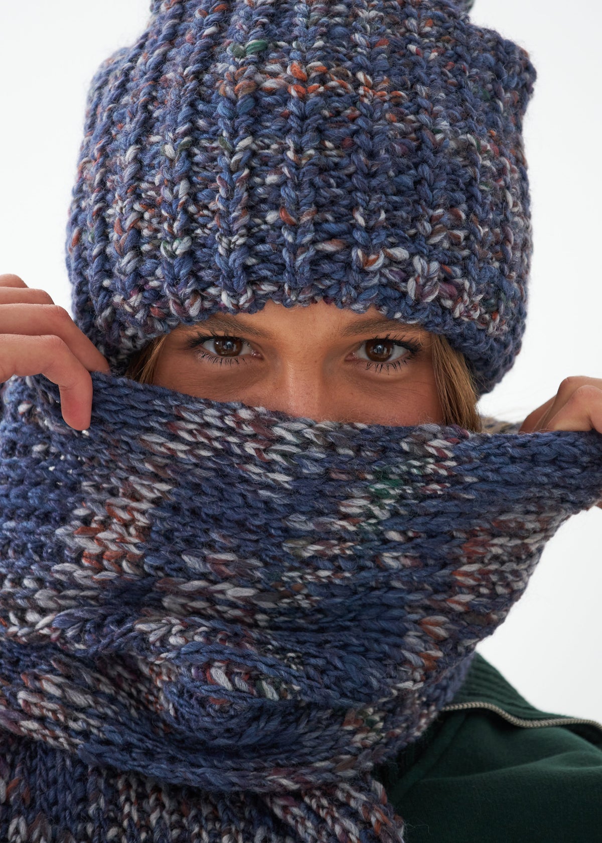 Oversized Lavender alpaca-wool scarf: Close-up holding the scarf near the face; beanie sold separately