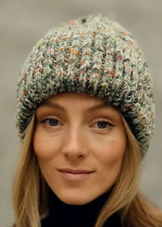Tokyo Green cable knit wool beanie: Front close-up of the folded cuff