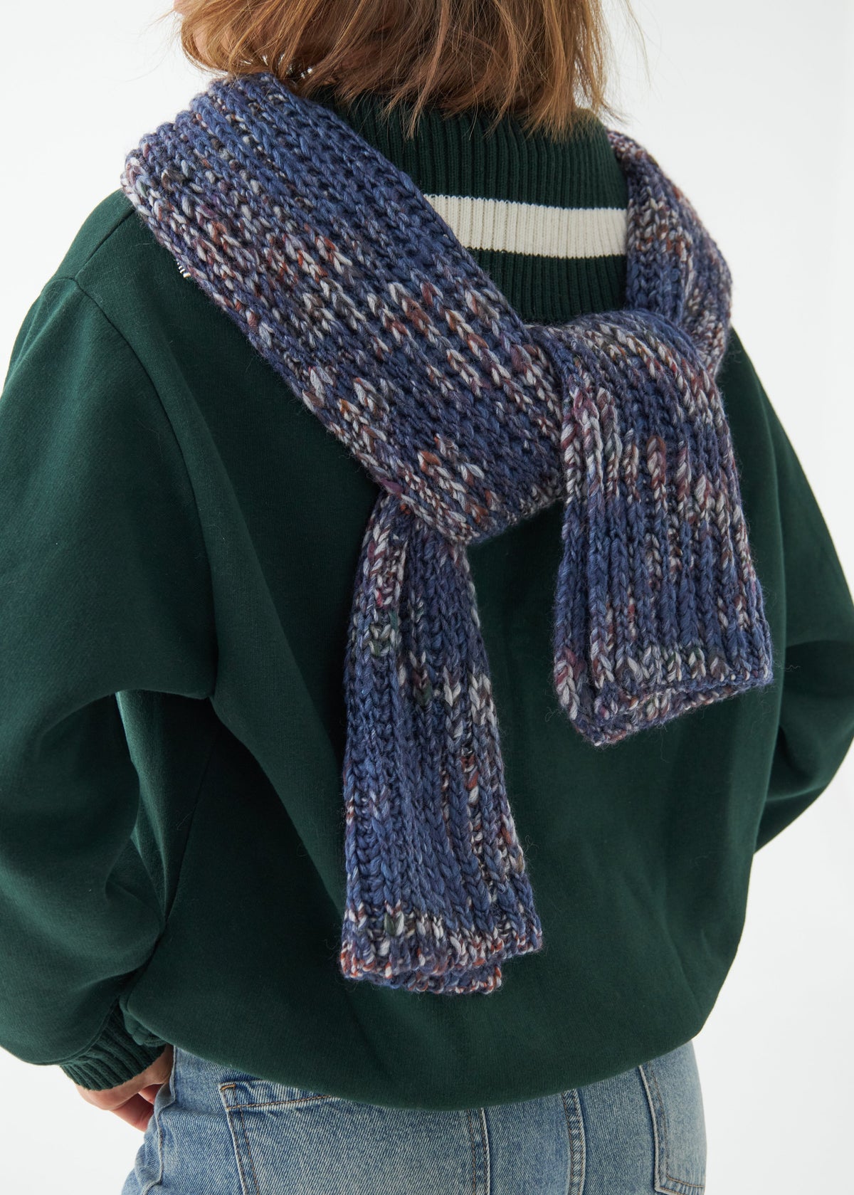 Oversized Lavender alpaca-wool scarf: Back view showing scarf tied behind the neck; beanie sold separately
